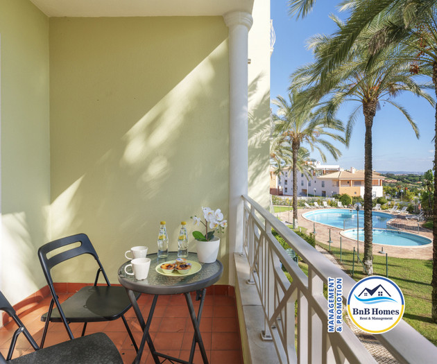 BnB Homes apartment with cozy Terrace & pool
