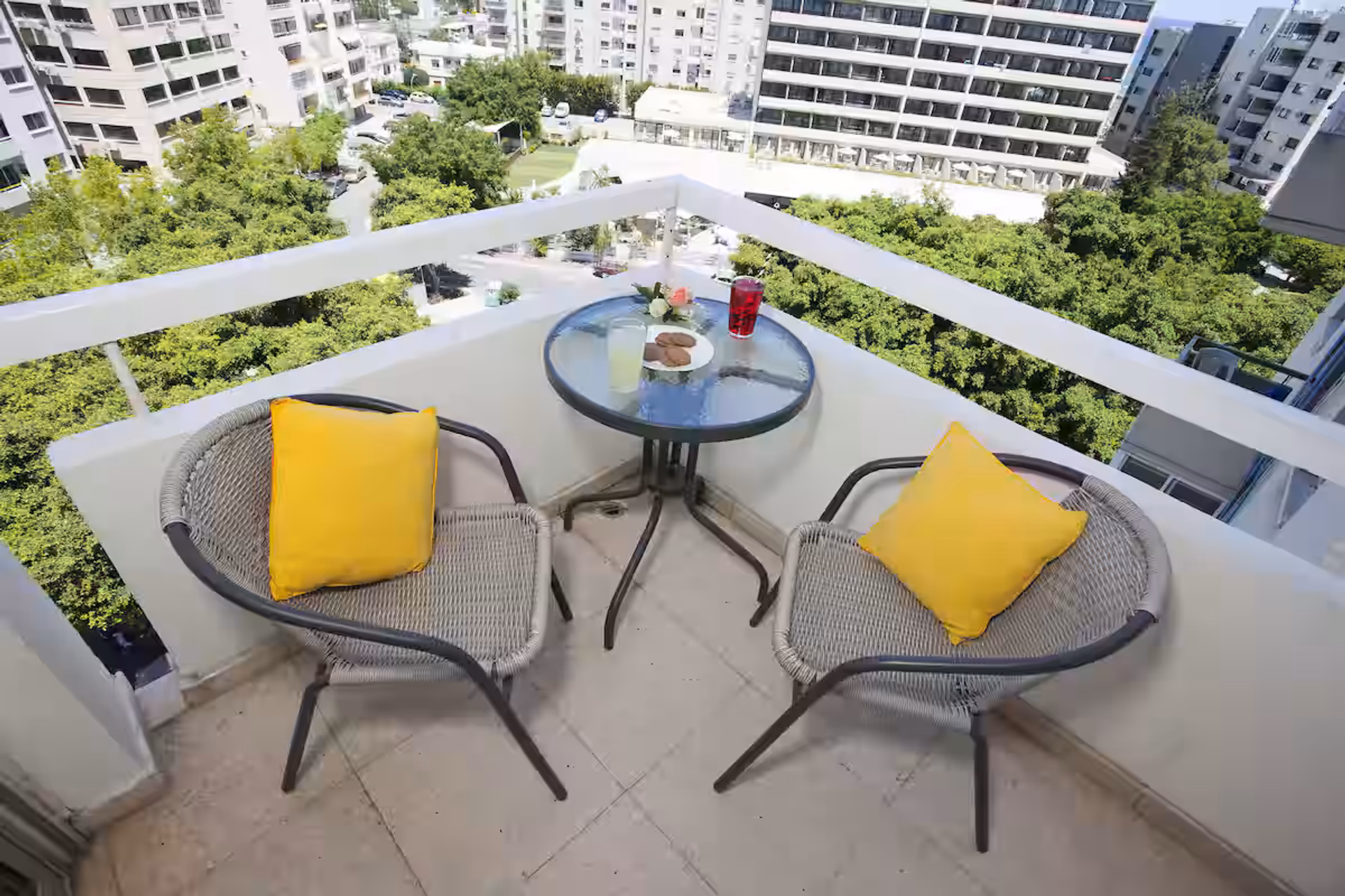 Balcony with seating and city view