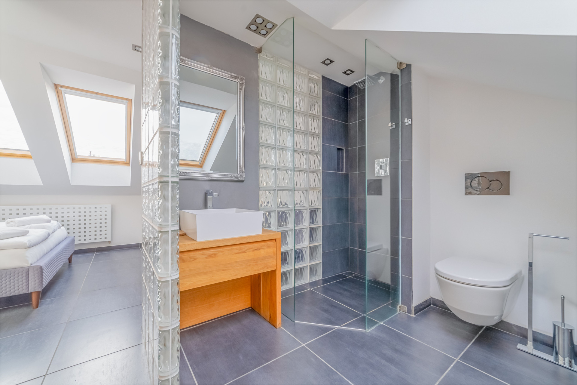 Bathroom with glass shower and toilet