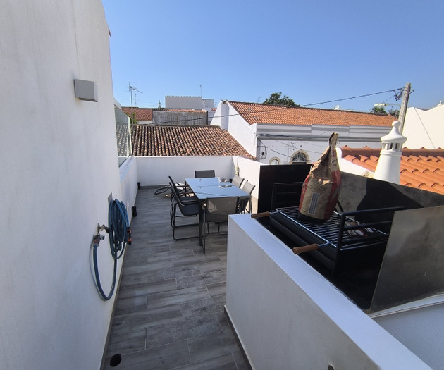 Rooftop terrace with dining set