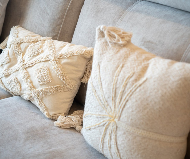 Decorative cushions on sofa