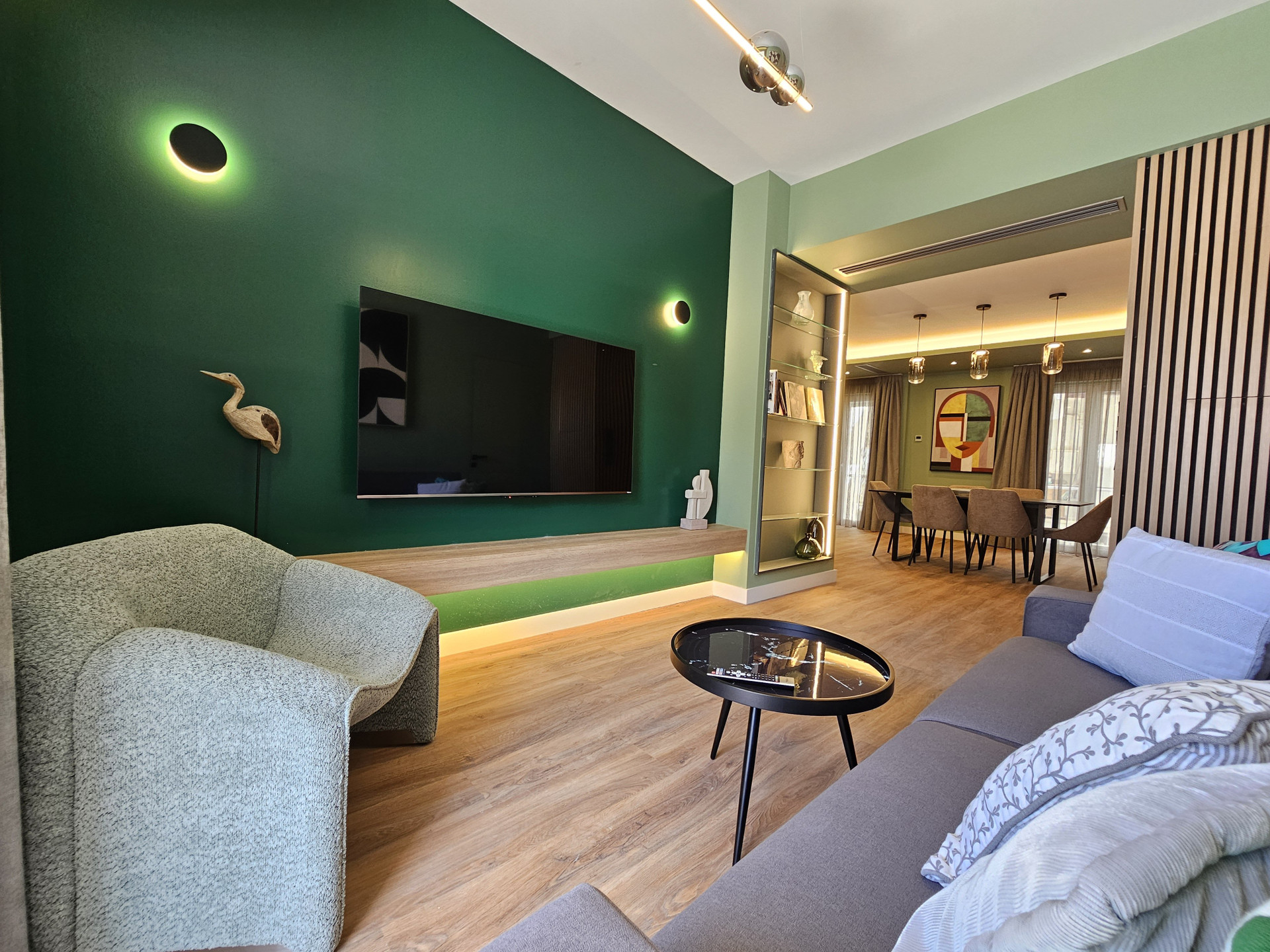 Living room with green accent wall