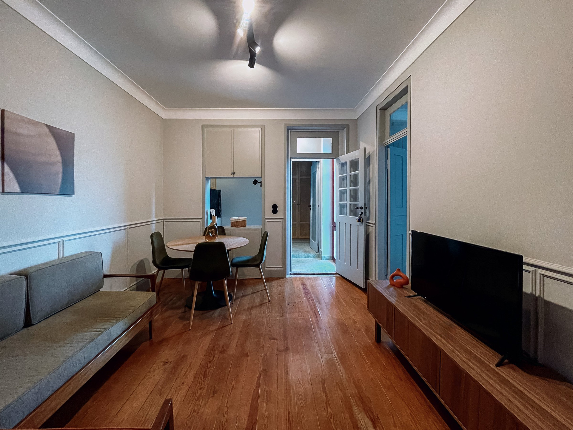 Living area with sofa and dining table
