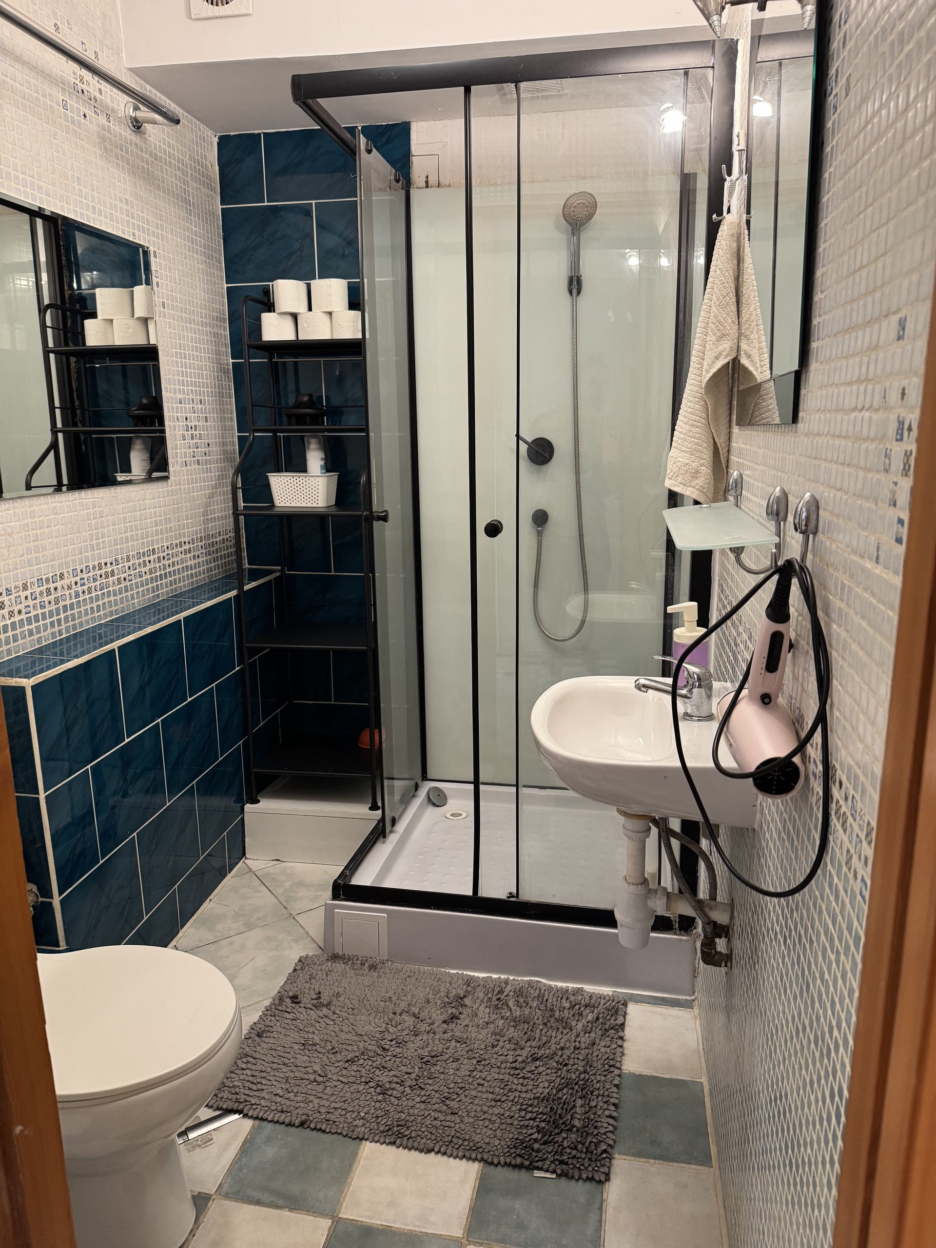 Bathroom with shower and sink