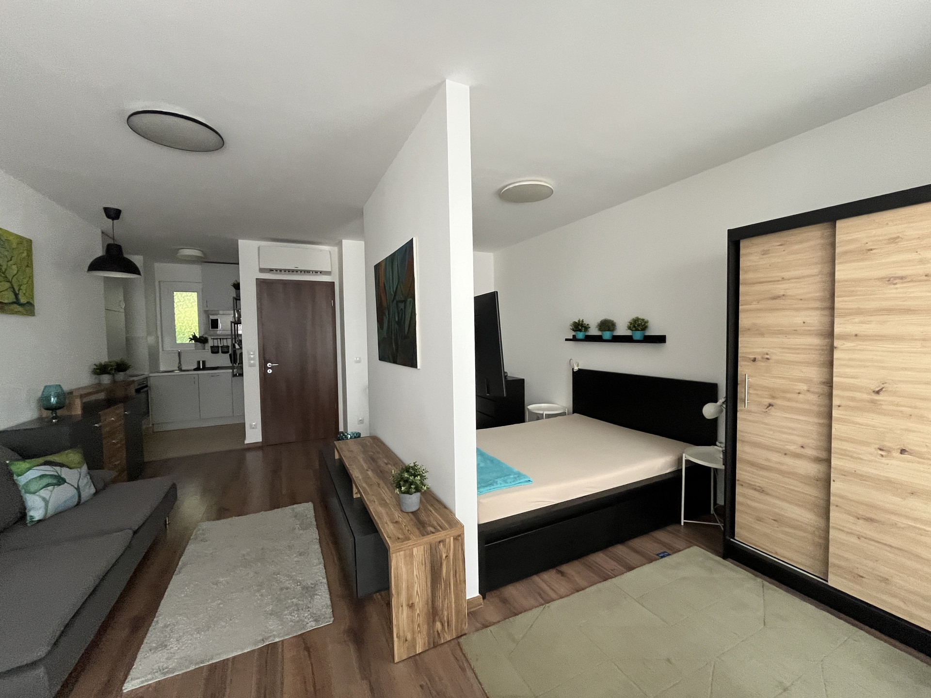 Studio living area with bedroom nook