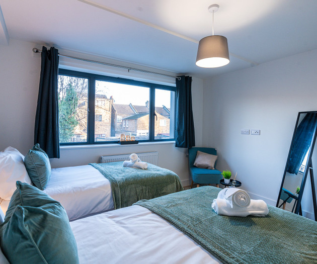 Twin bedroom with window view