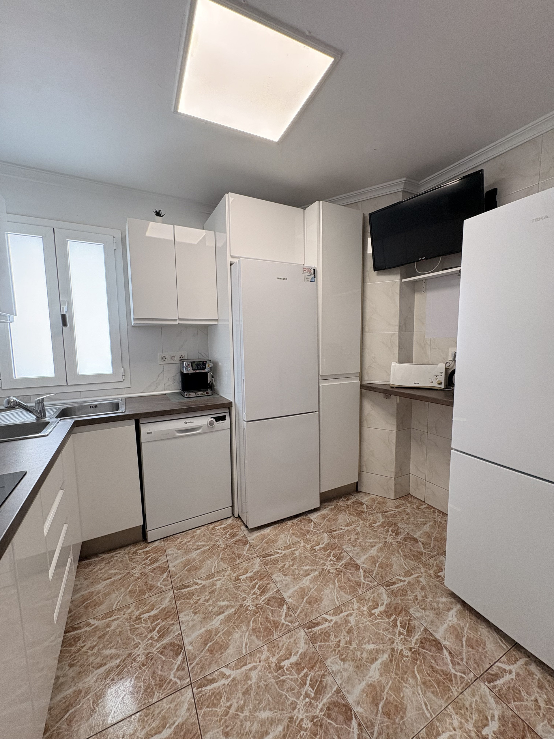 White kitchen with appliances