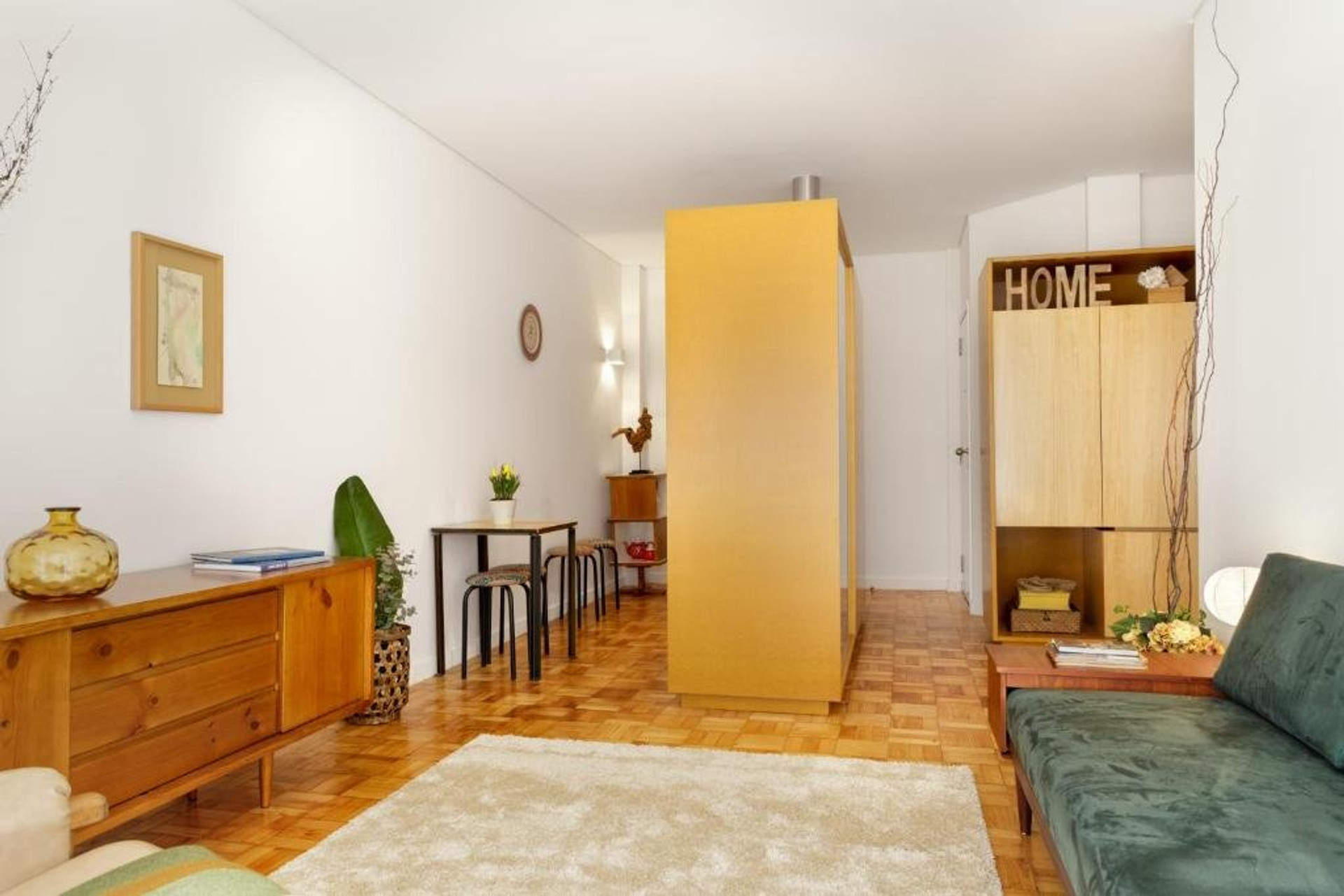 Open living area with sofa and dining