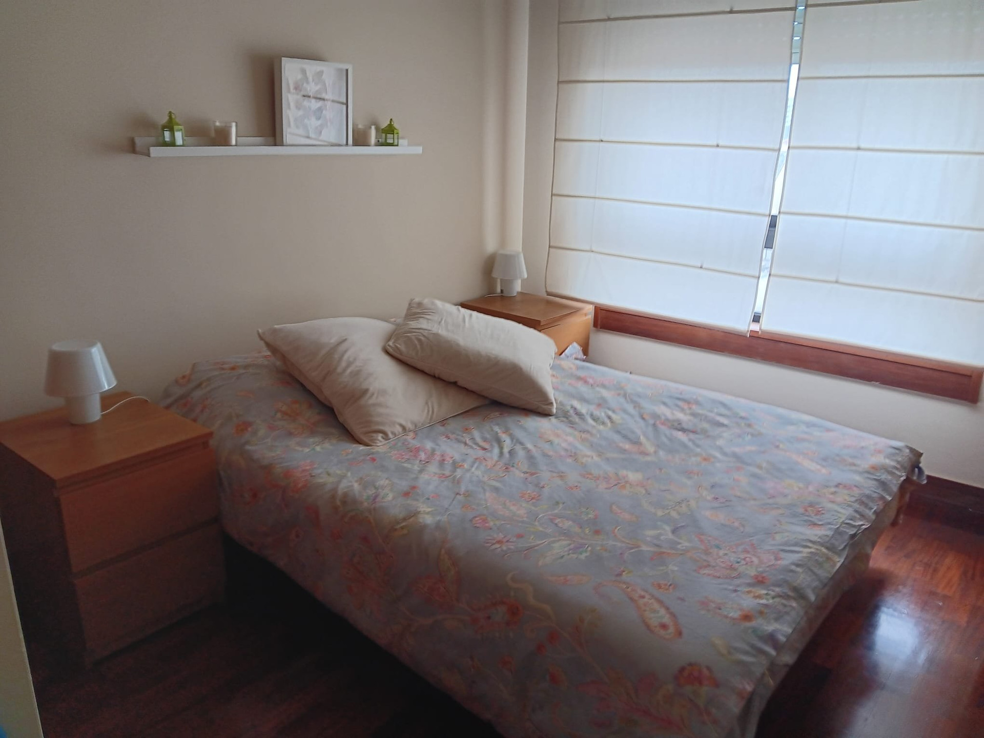 Double bedroom with wooden floor