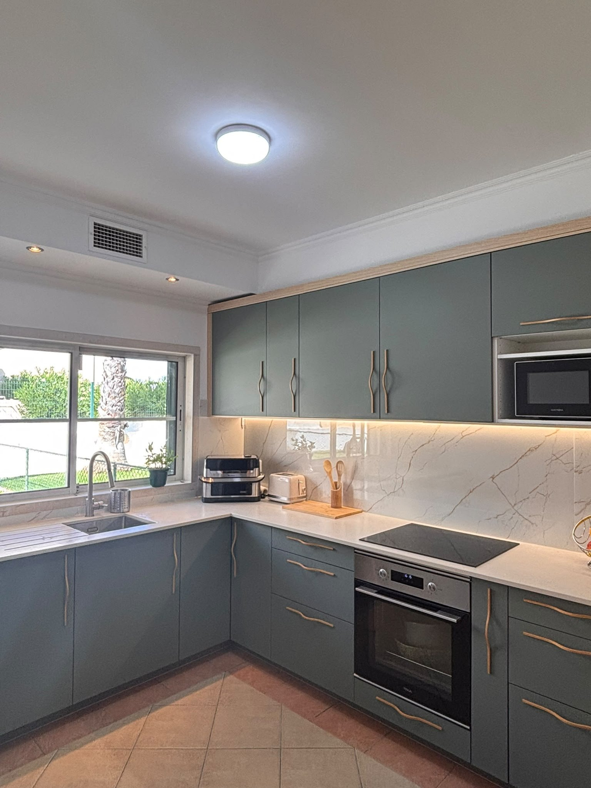 Kitchen with window and sink