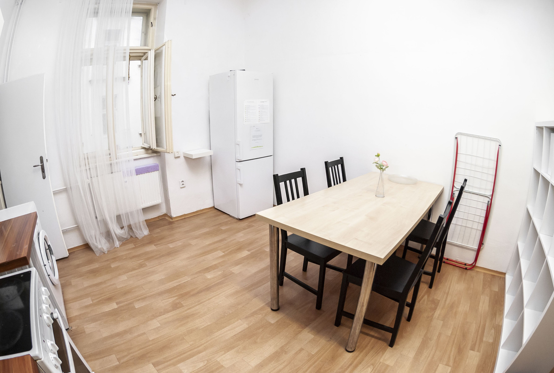 Dining area with table and fridge