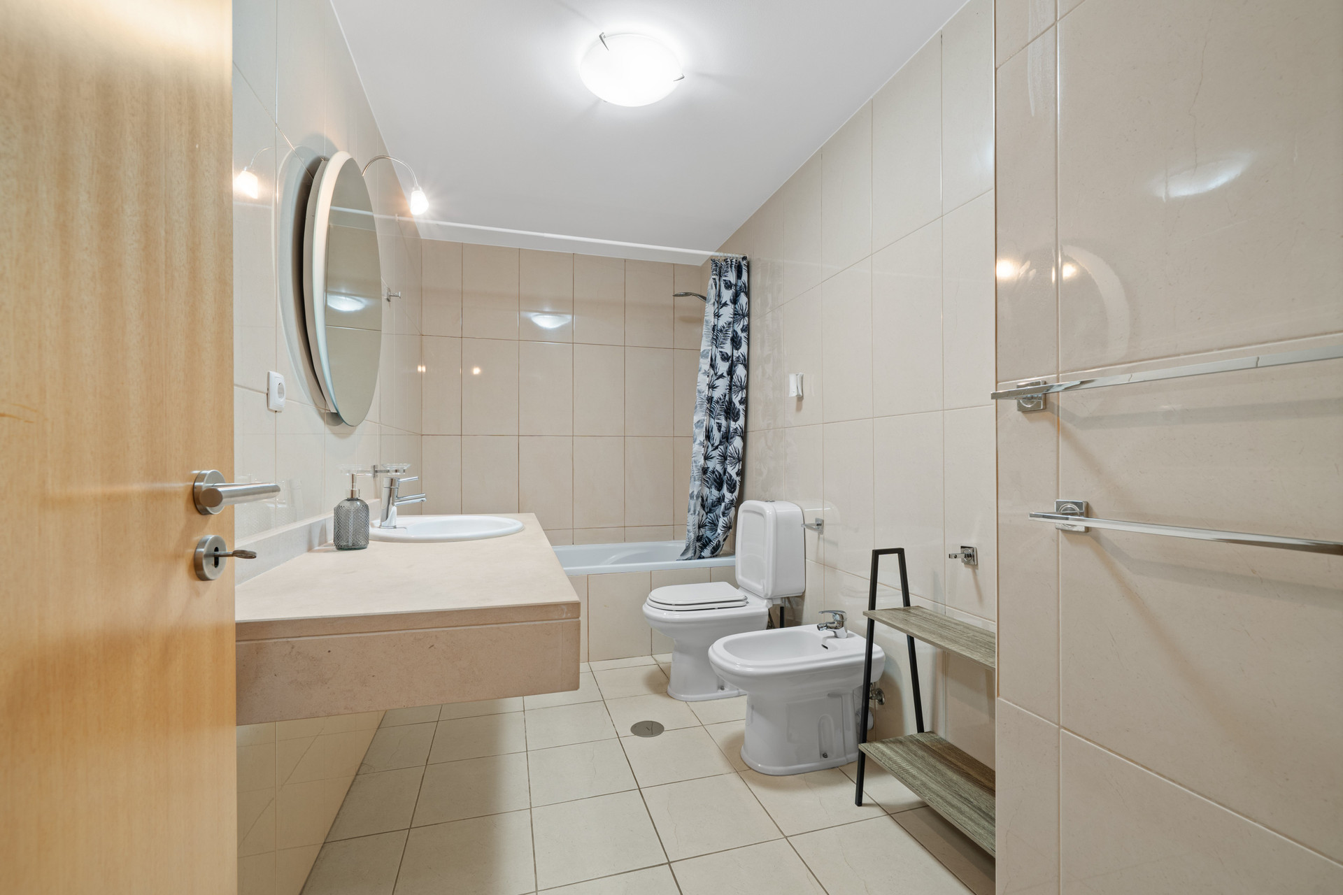 Bathroom with bathtub and bidet