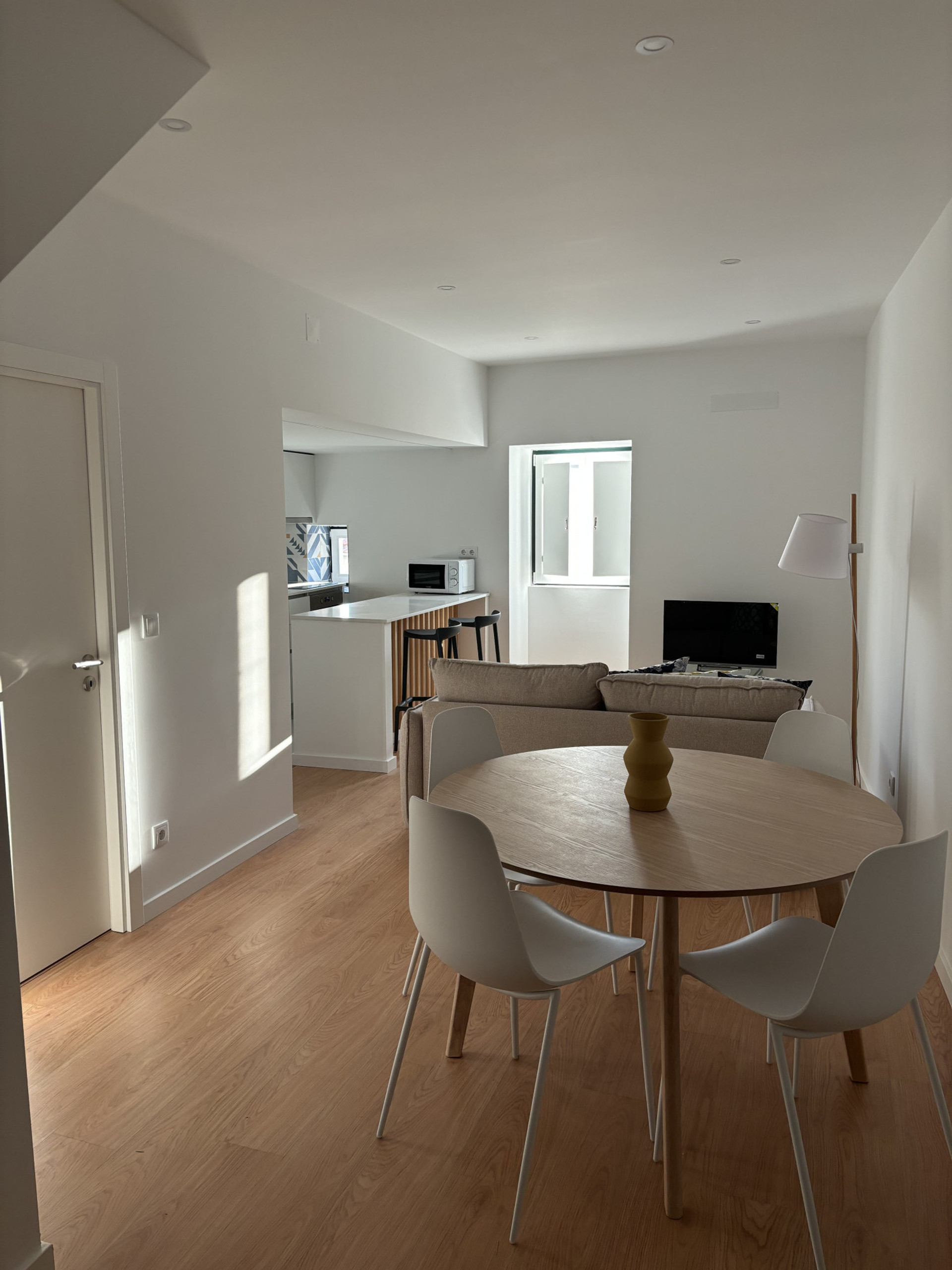 Dining table with open kitchen