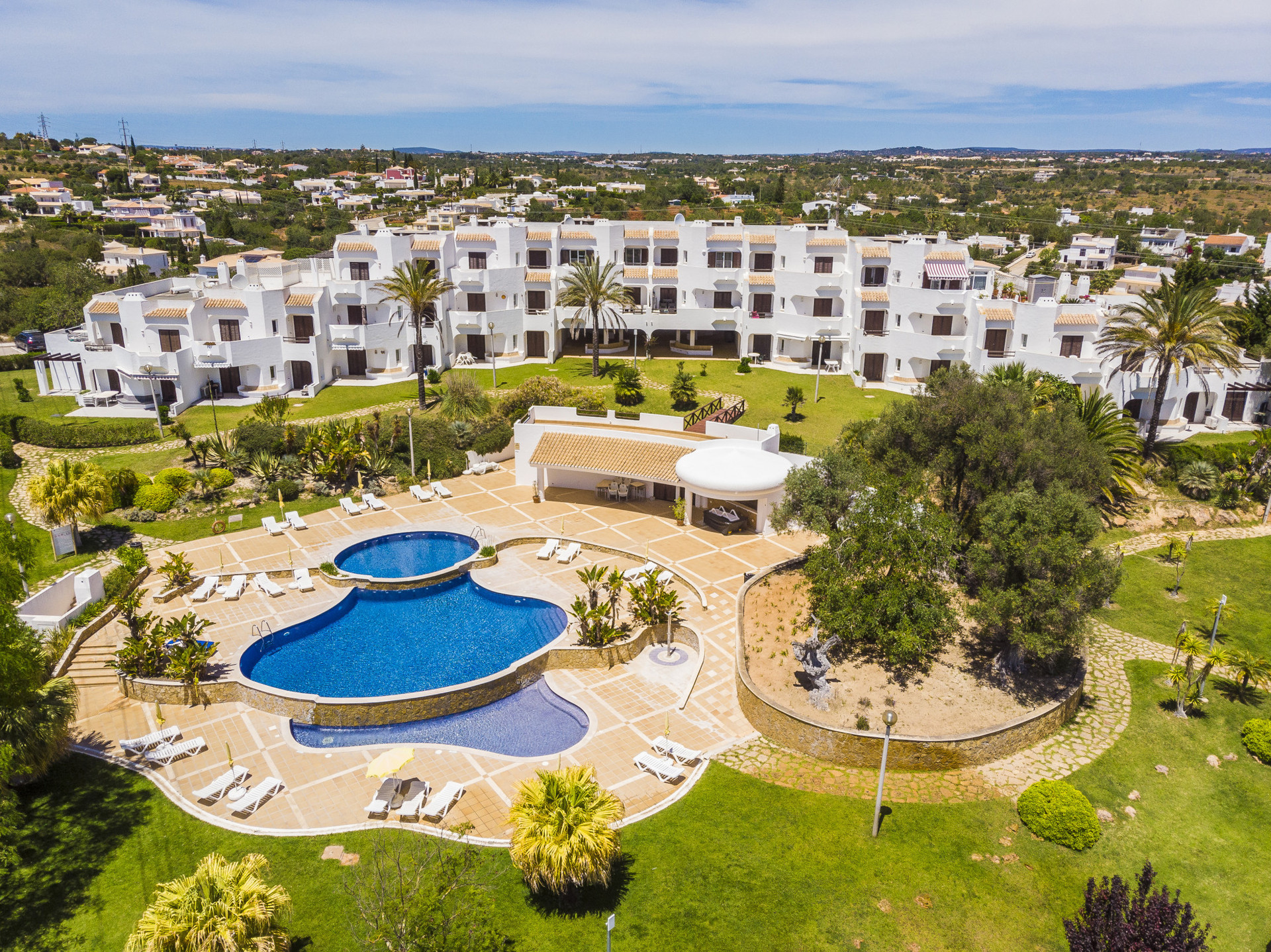 Clube Albufeira, a resort with 4 outdoor swimming pools, snack-bars, mini-golf, restaurants and playground.