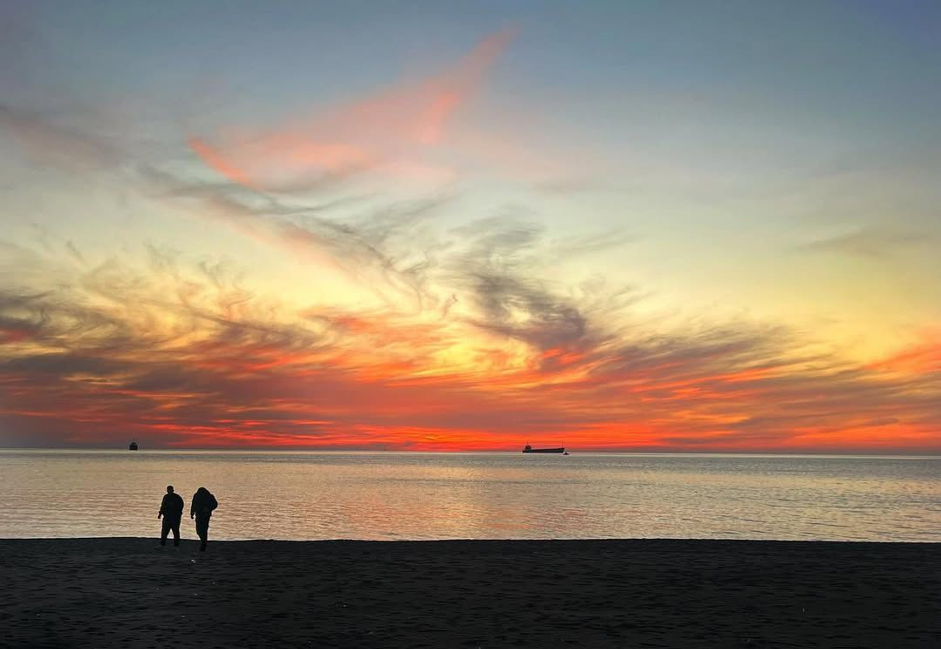 Stunning beach sunset silhouette