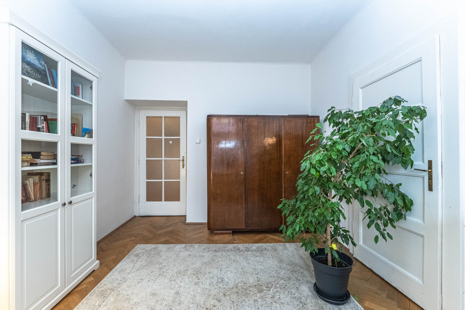 Room with bookcase and wardrobe