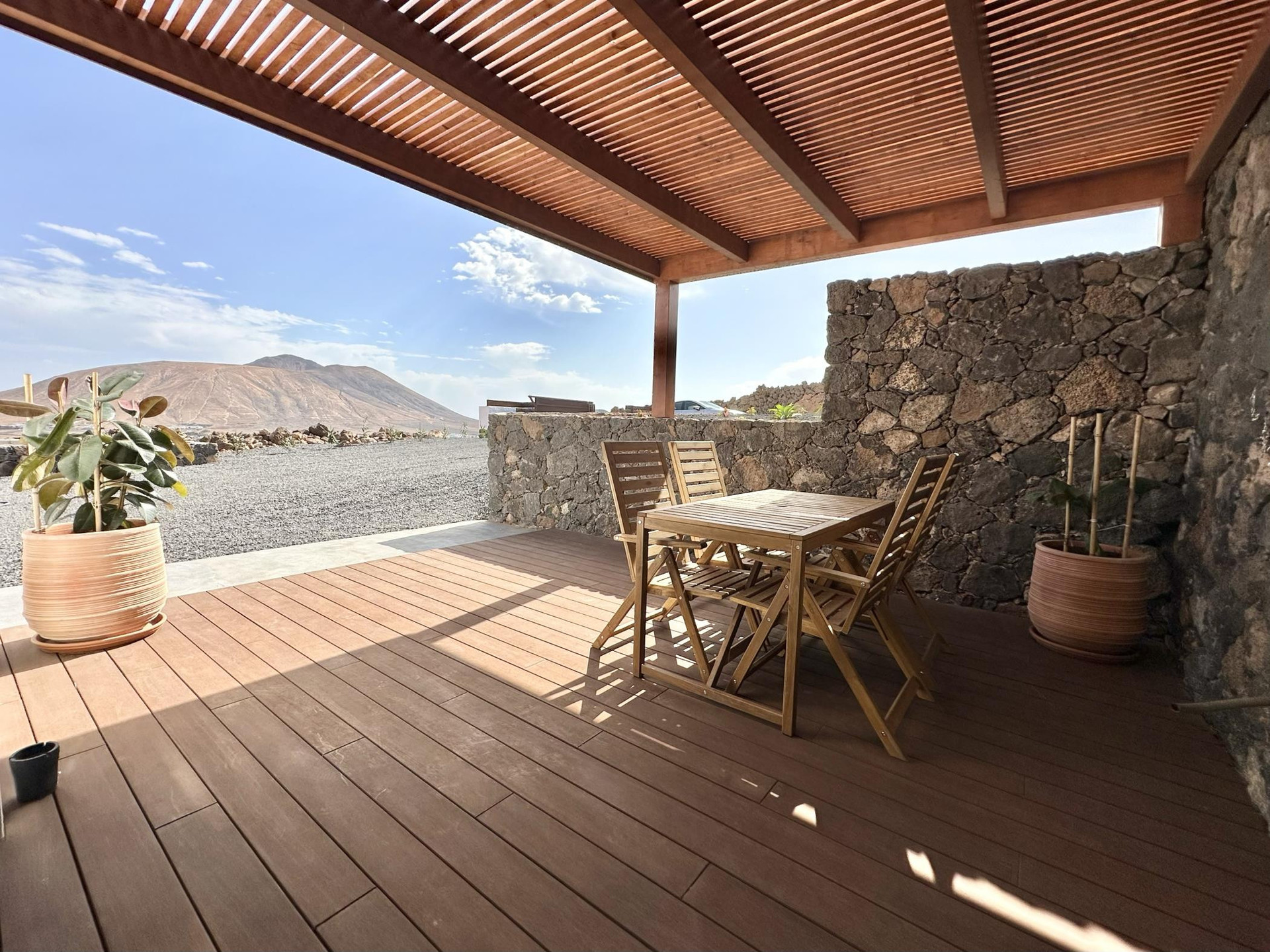 Covered terrace dining table mountain view