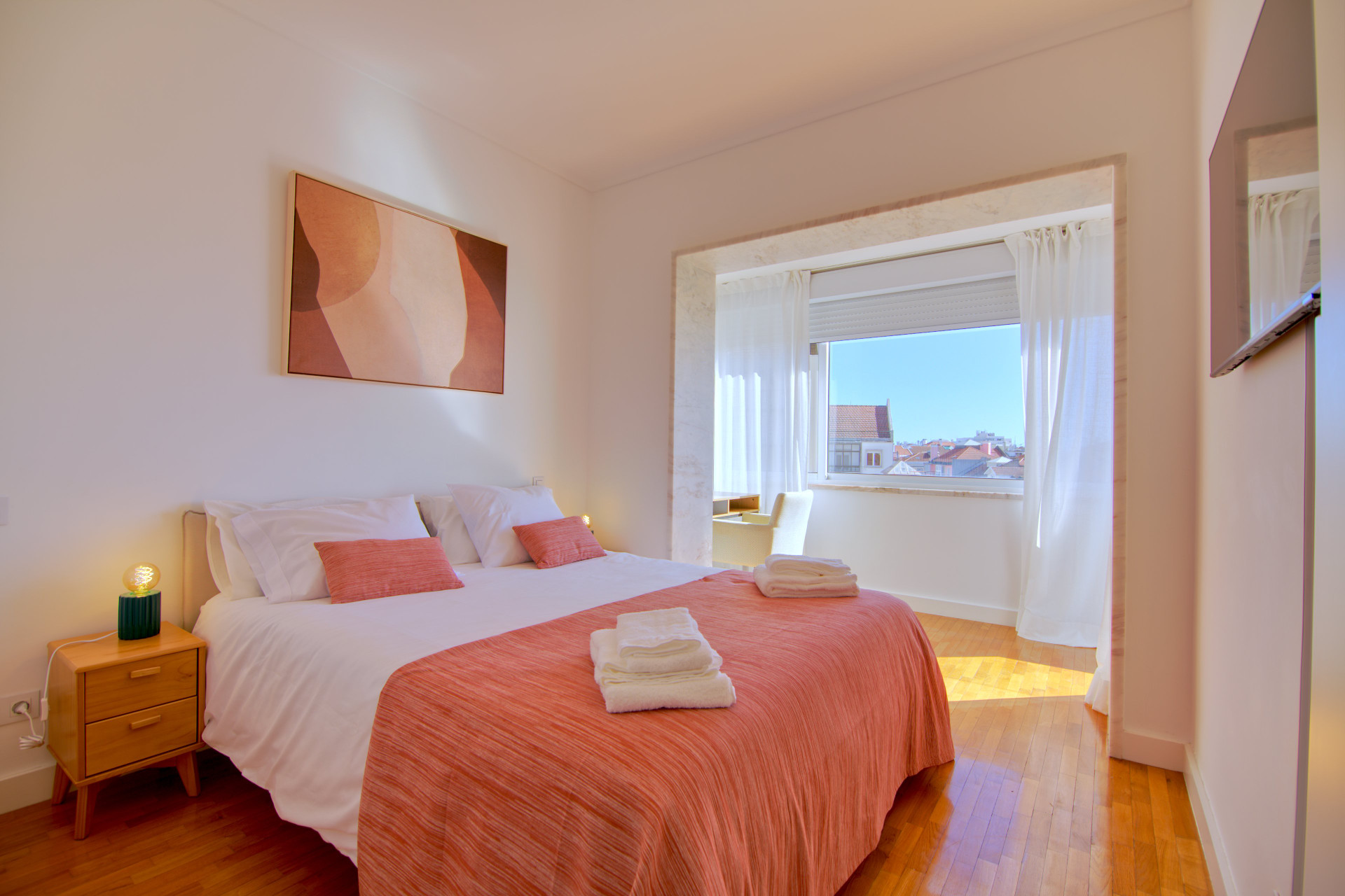 Bright master bedroom with window view