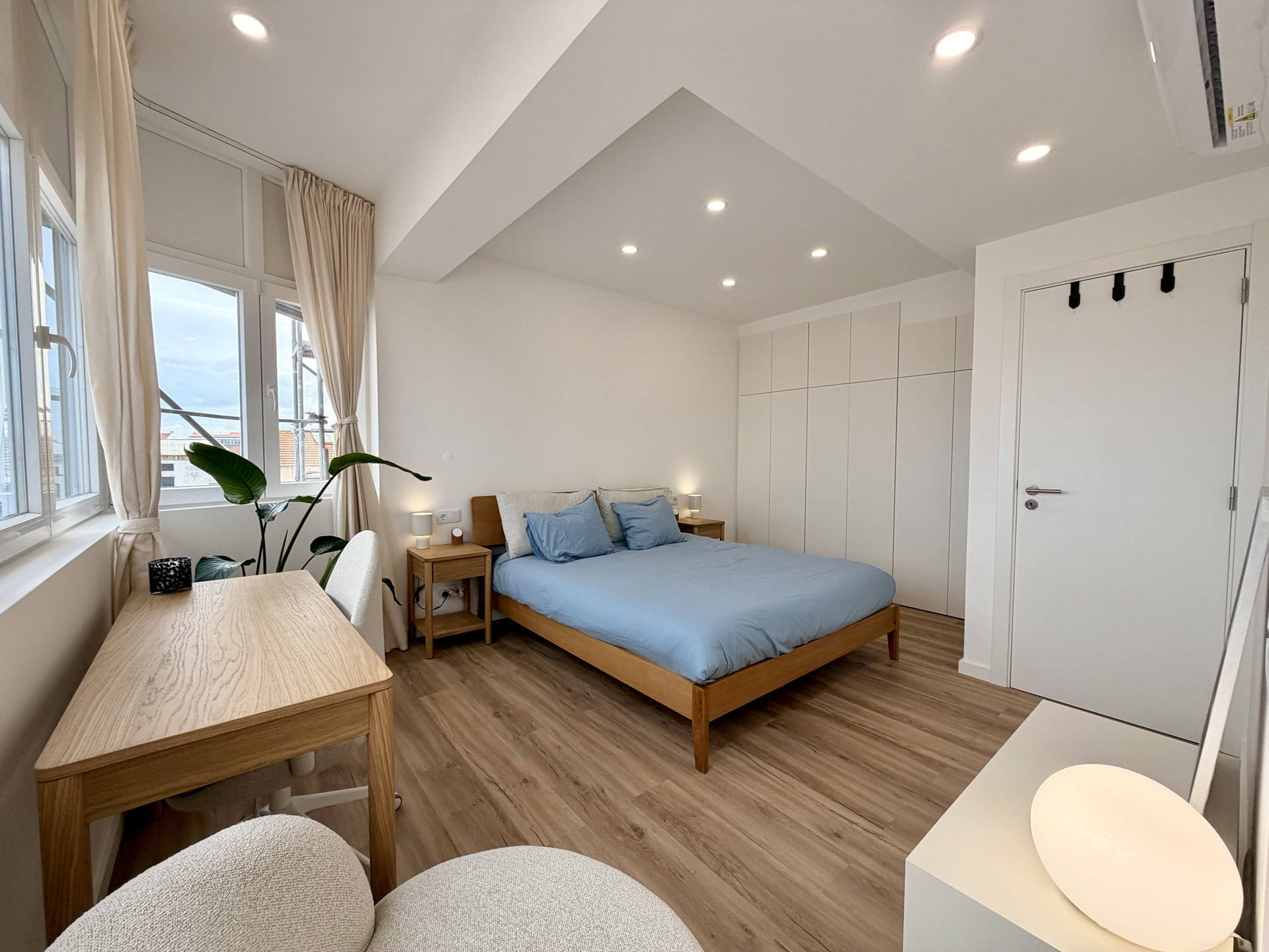 Spacious master bedroom with wardrobe