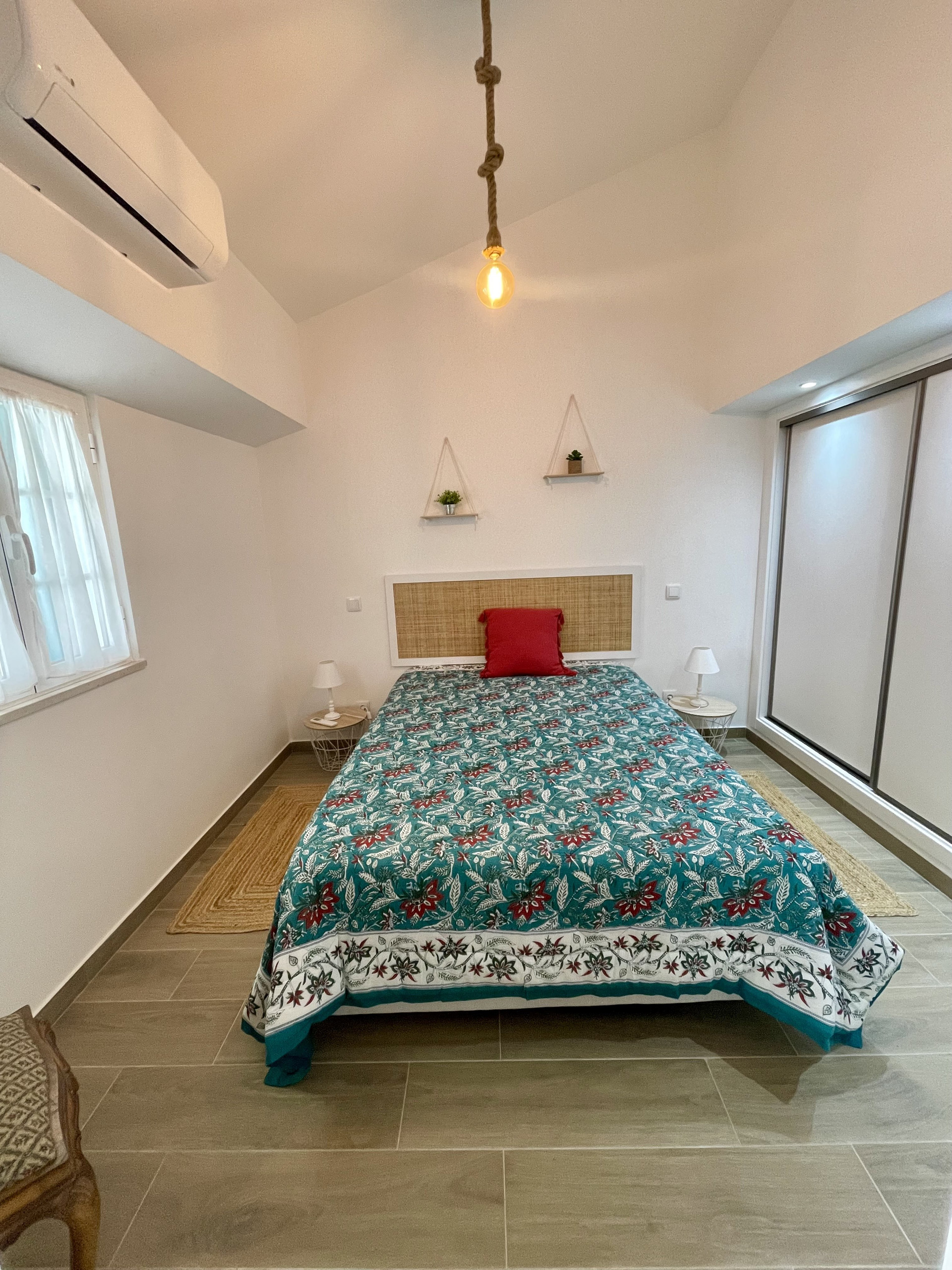 Bedroom with double bed wardrobe