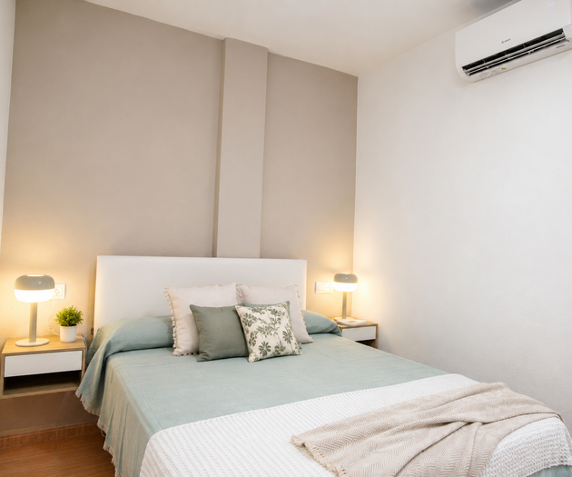 Bedroom with AC unit