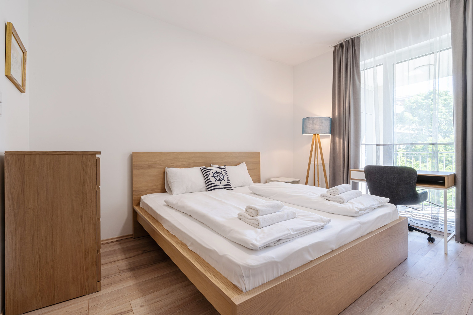 Bright bedroom with double bed