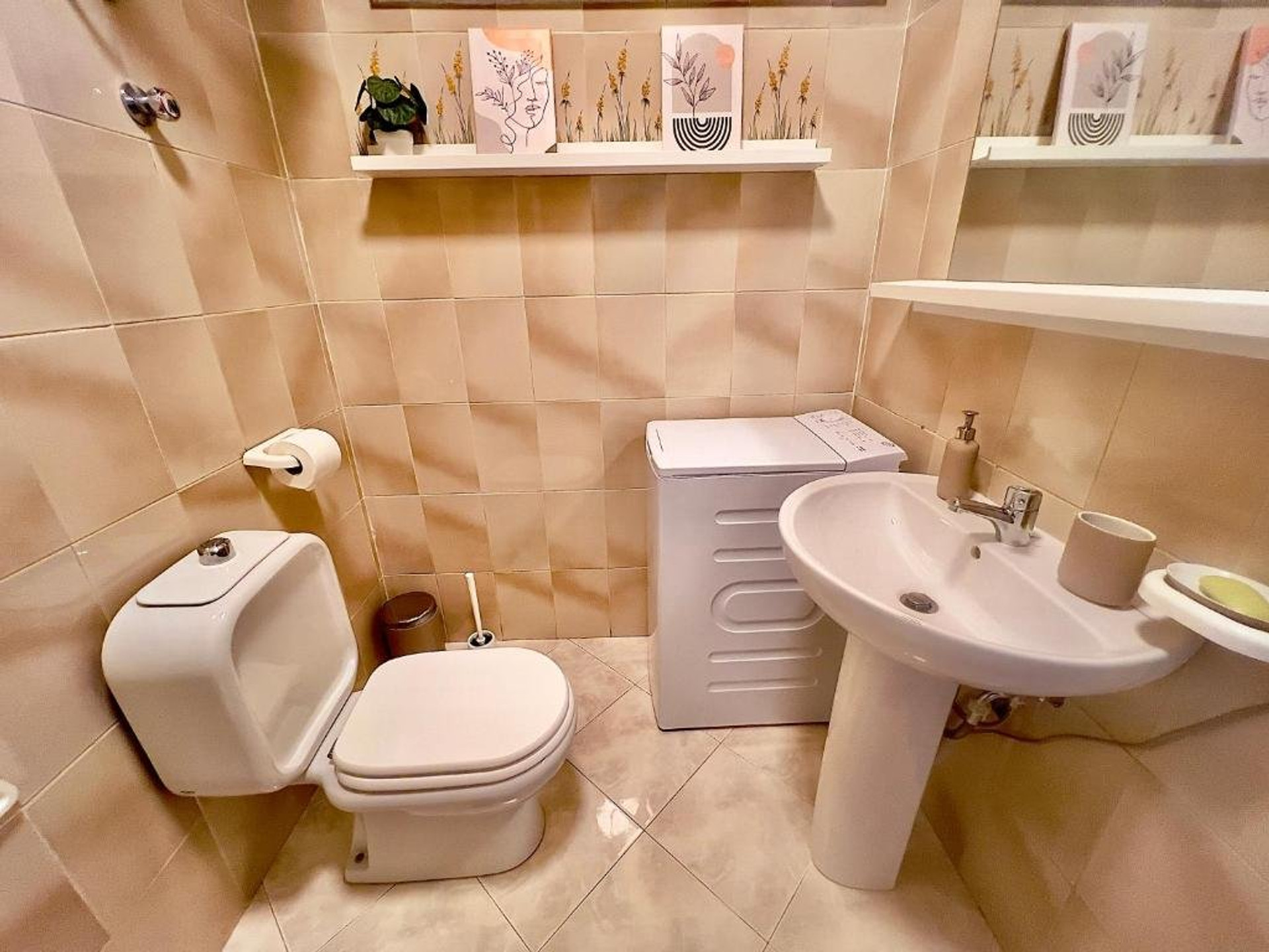 Compact bathroom with sink toilet