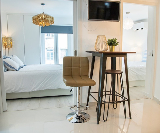 Open studio with bed and kitchen