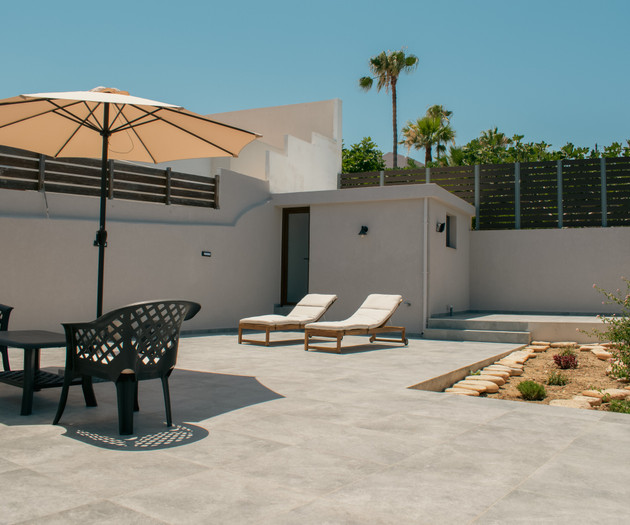 Sunny patio with lounge chairs