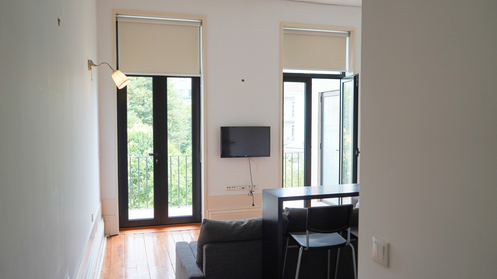 Bright living area dual balcony doors