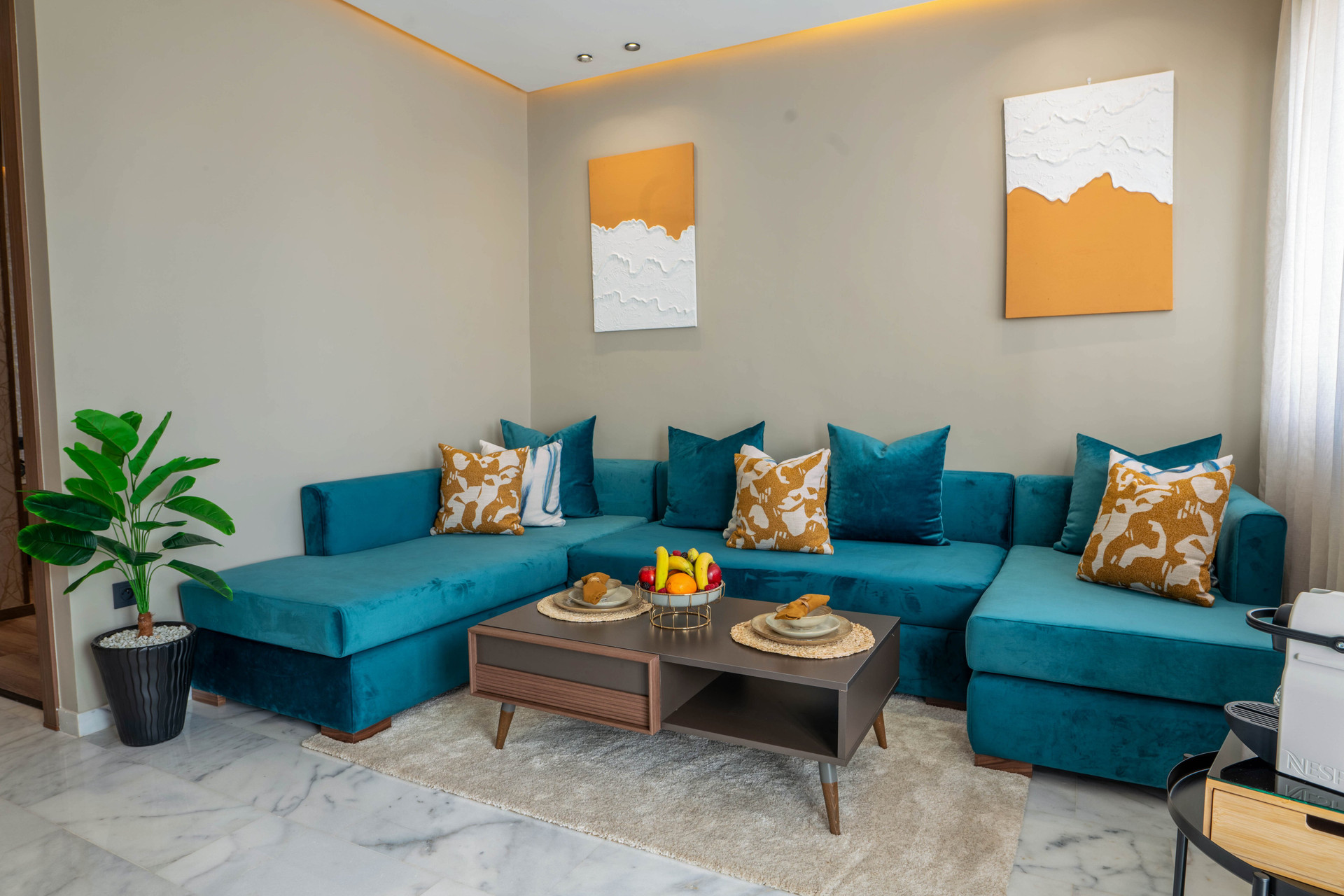 Teal sectional sofa living area
