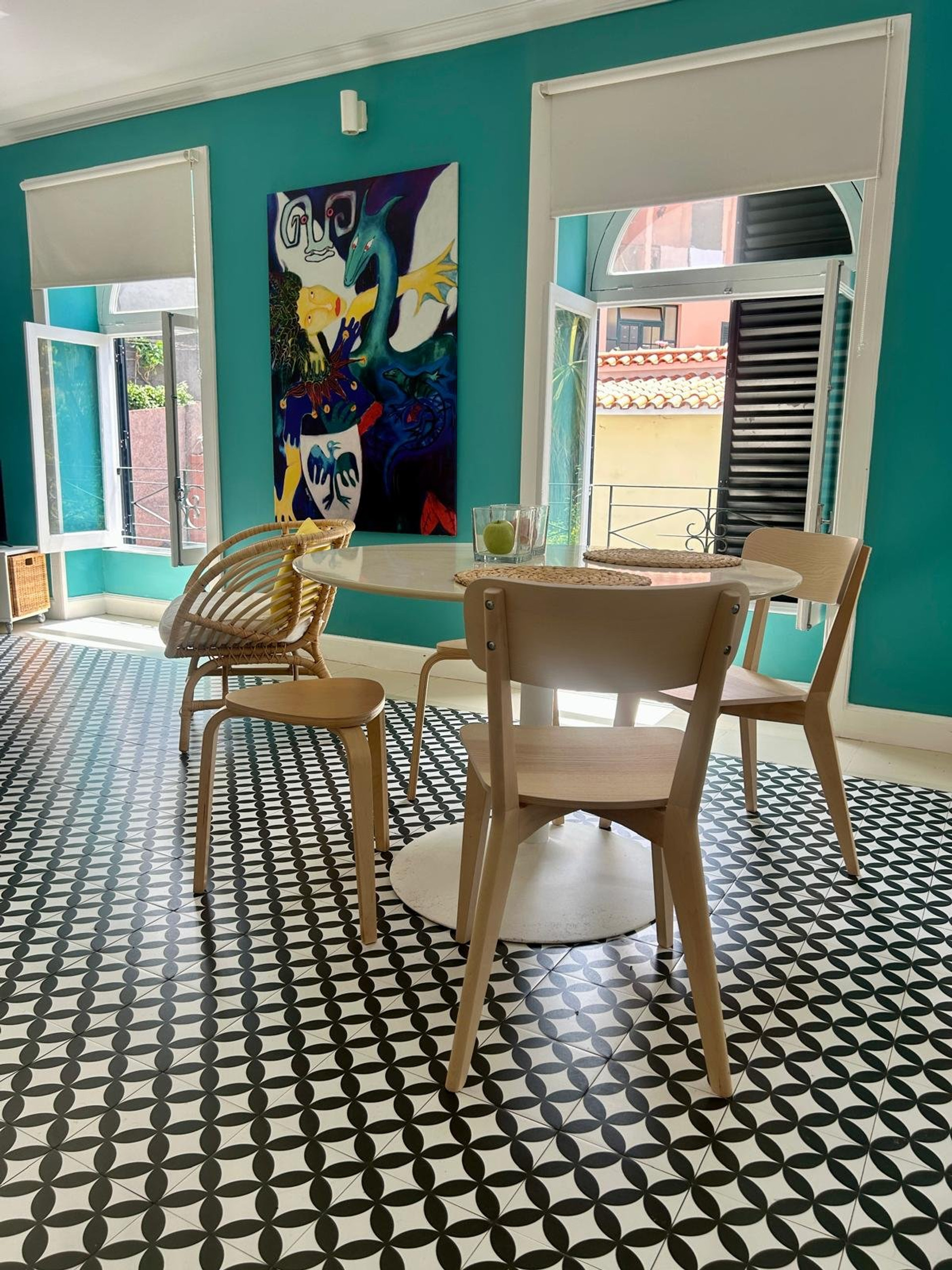 Round dining table by windows