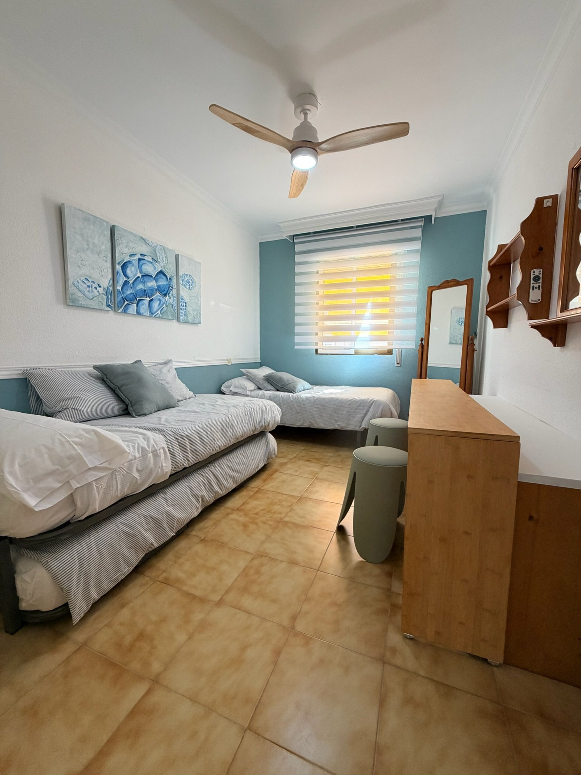 Twin bedroom with beach decor