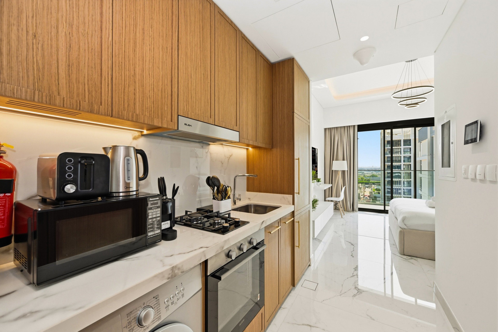 Kitchen with view into bedroom