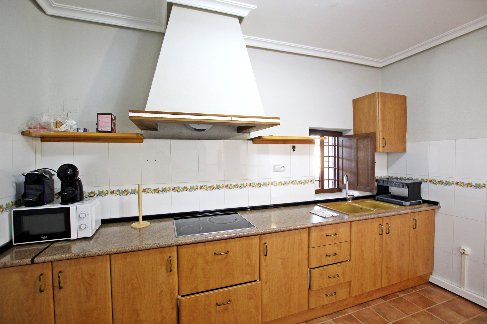 Kitchen with wood cabinets