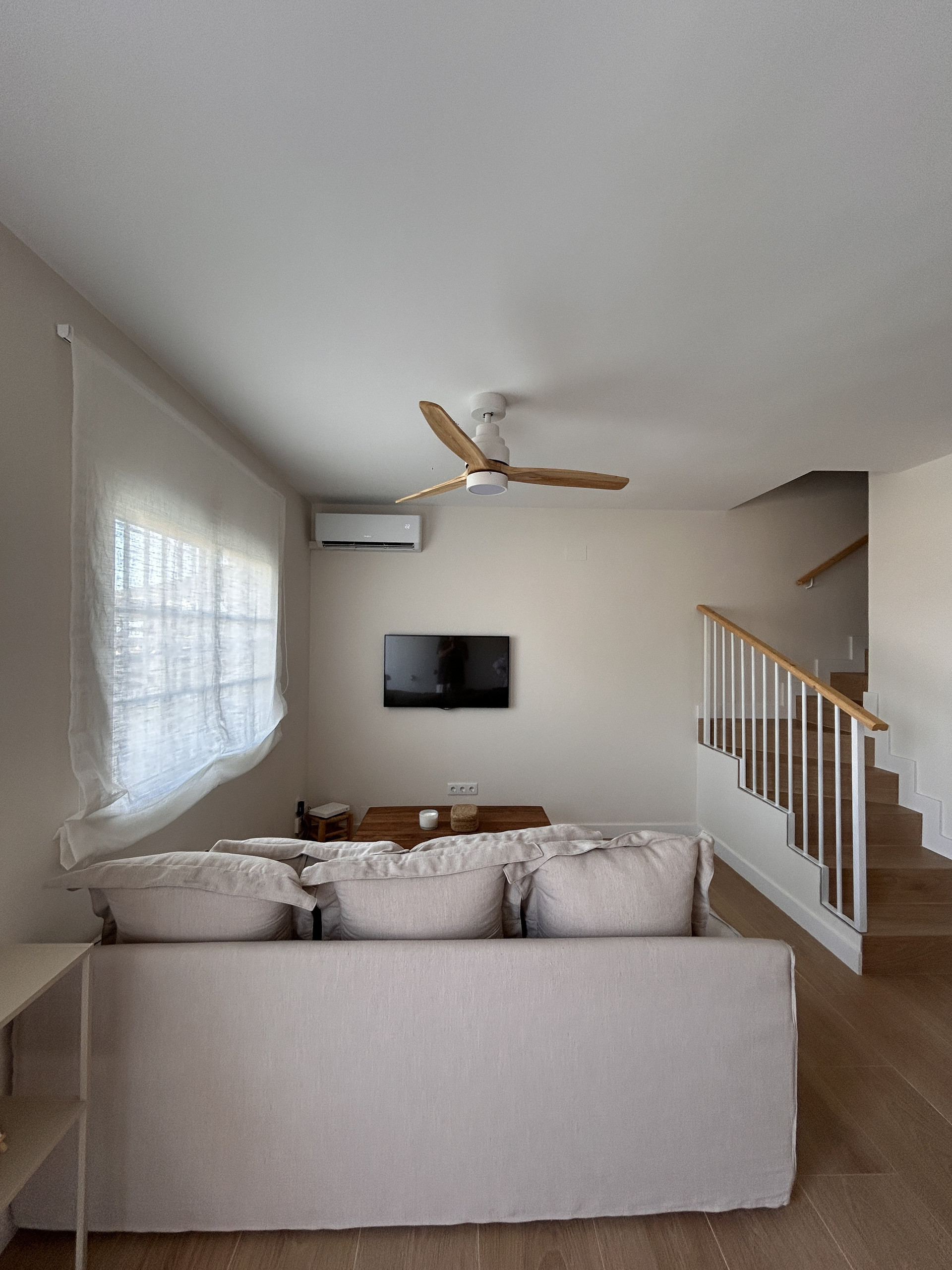 Living room with staircase view