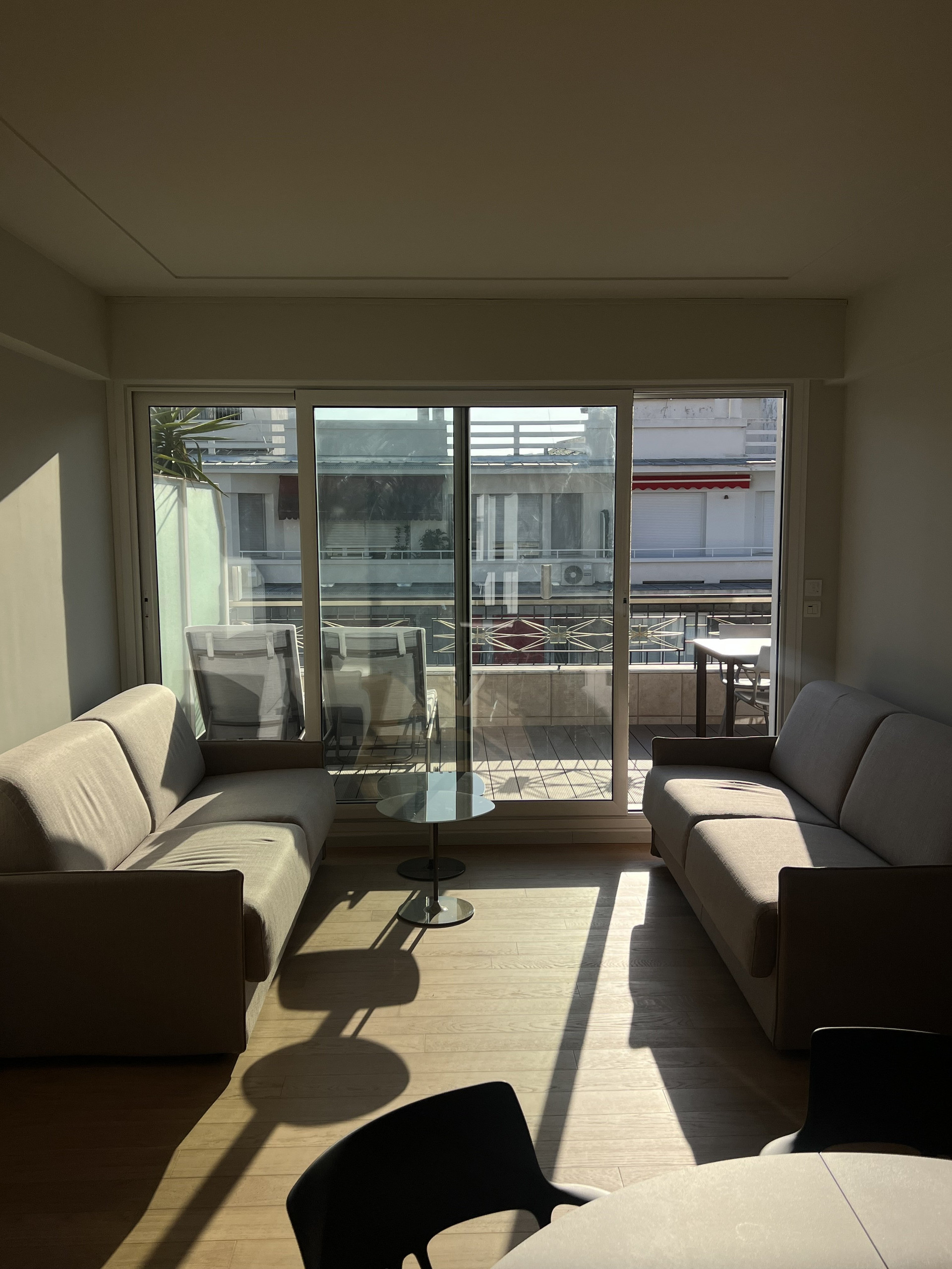 Living room sofa large window