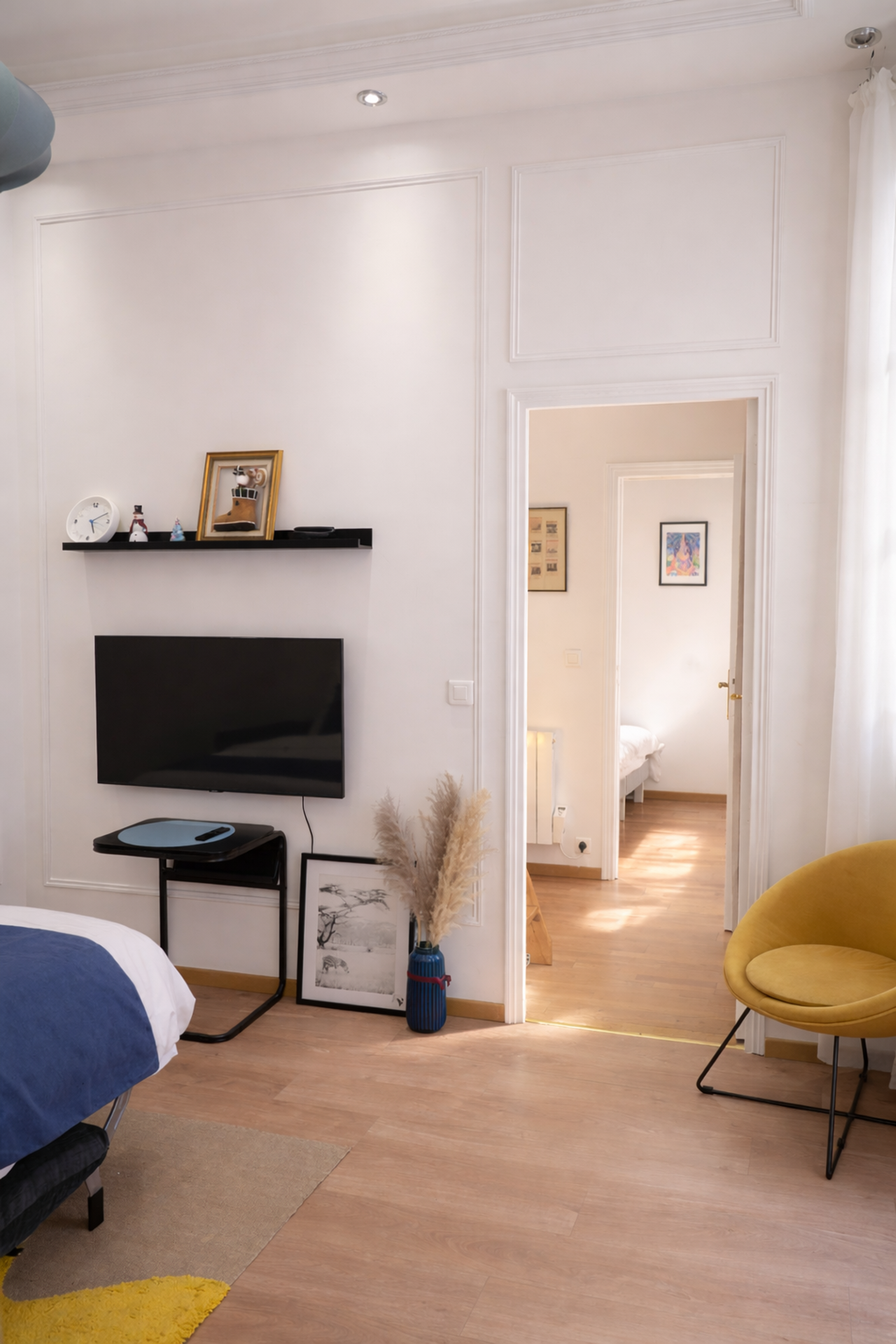 Bedroom with TV and seating