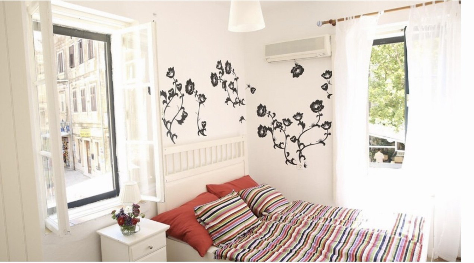 Bedroom with striped bedspread