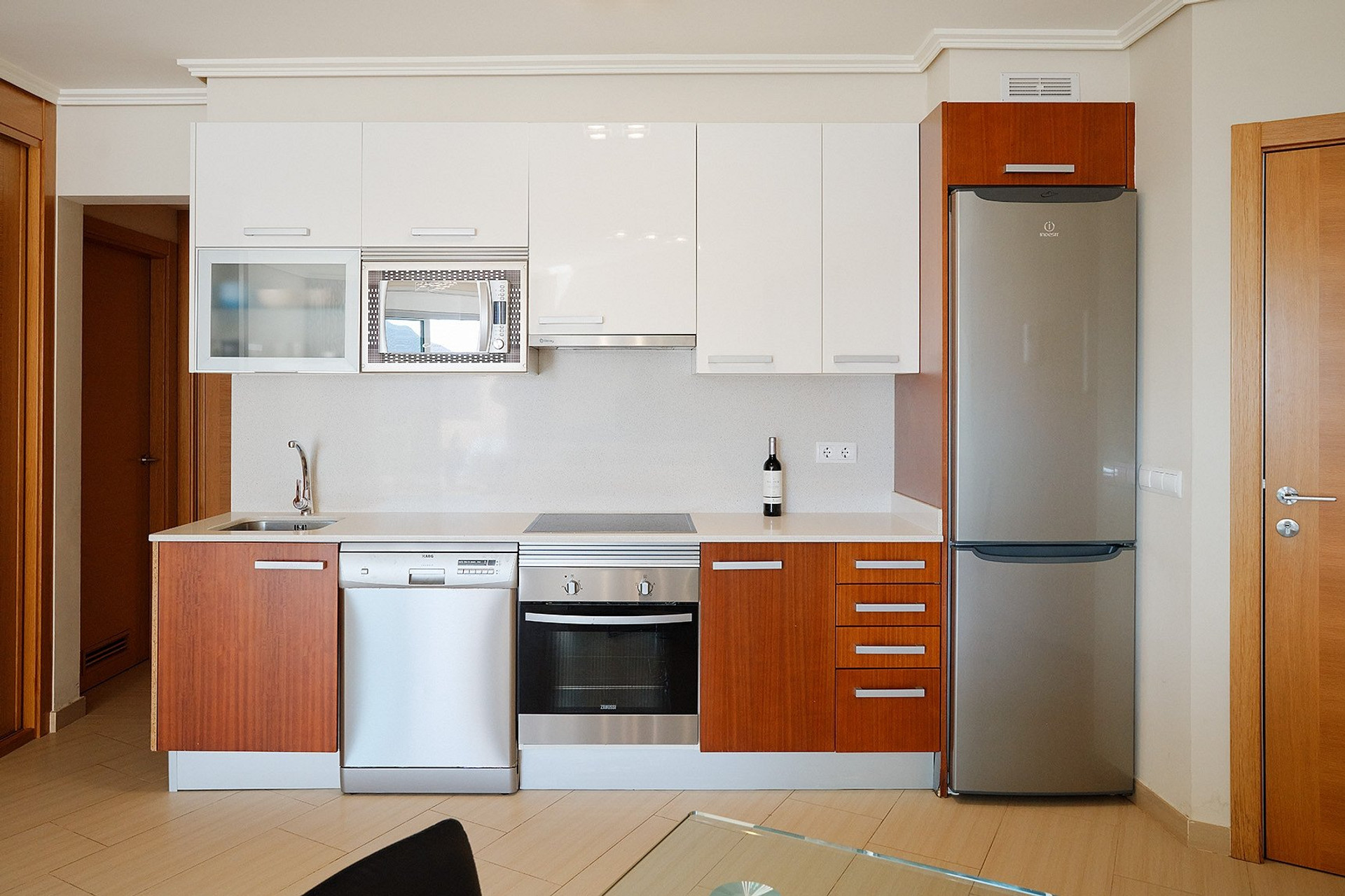 Fully equipped kitchen with appliances