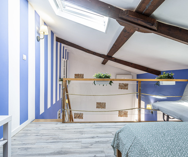 Loft with skylight and beams