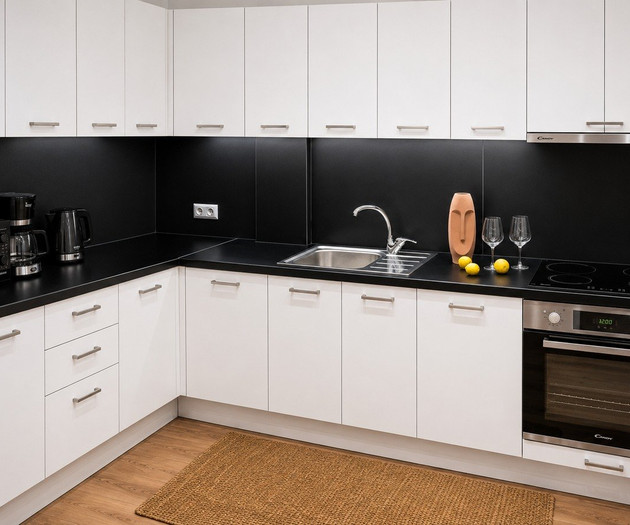 L-shaped kitchen with appliances