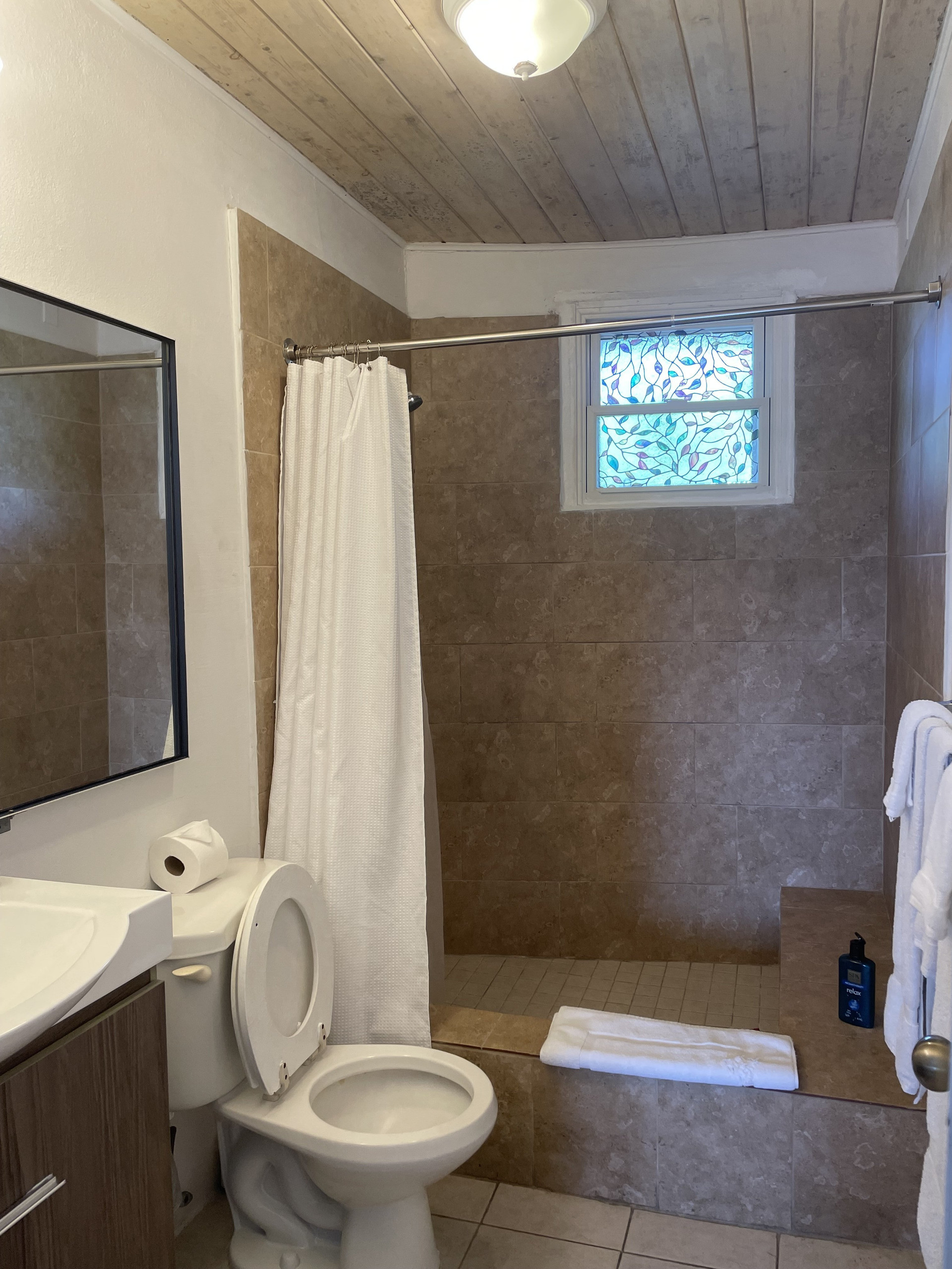 Bathroom with tiled shower