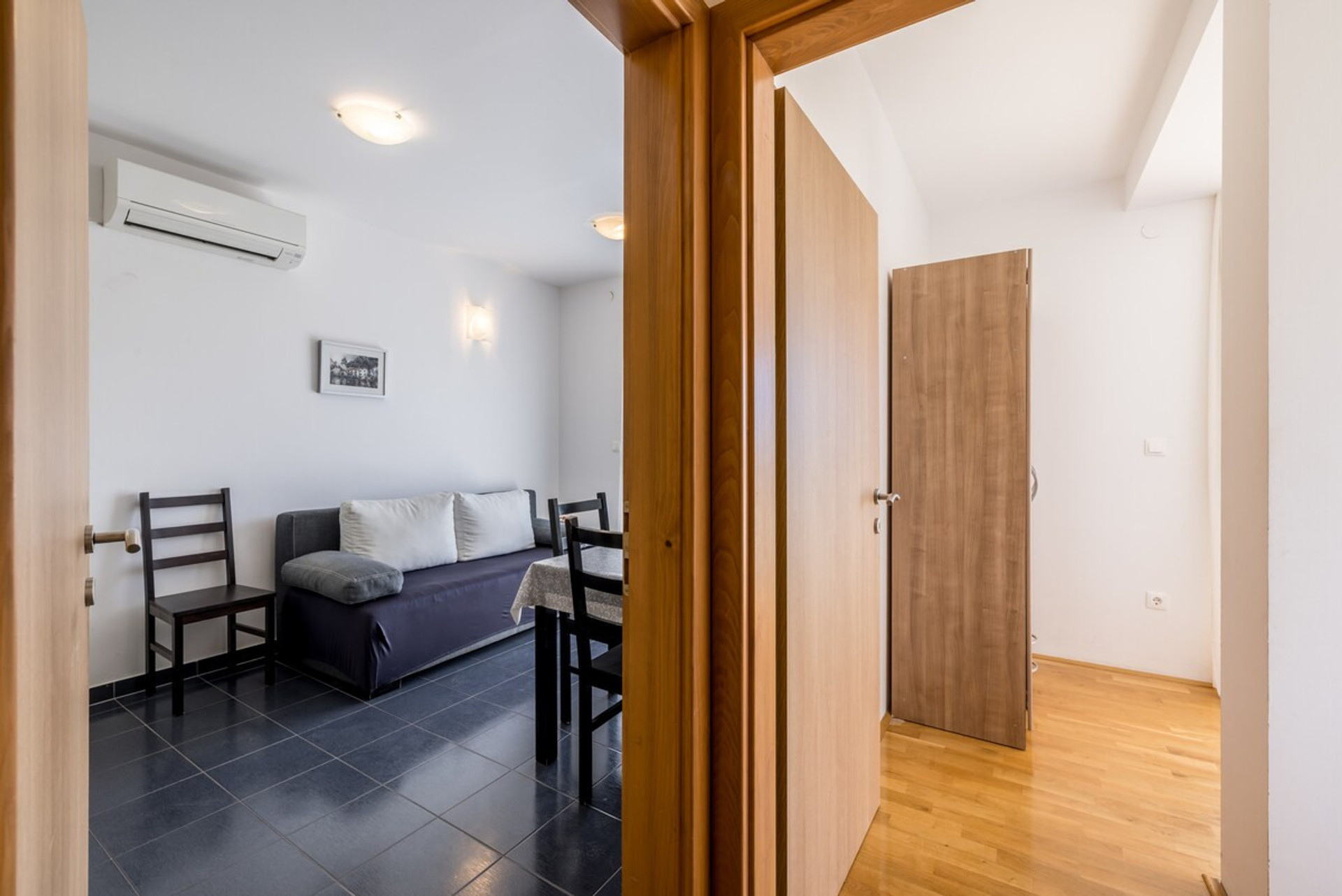 Living room and bedroom entrance.