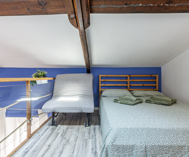 Loft bedroom with double bed