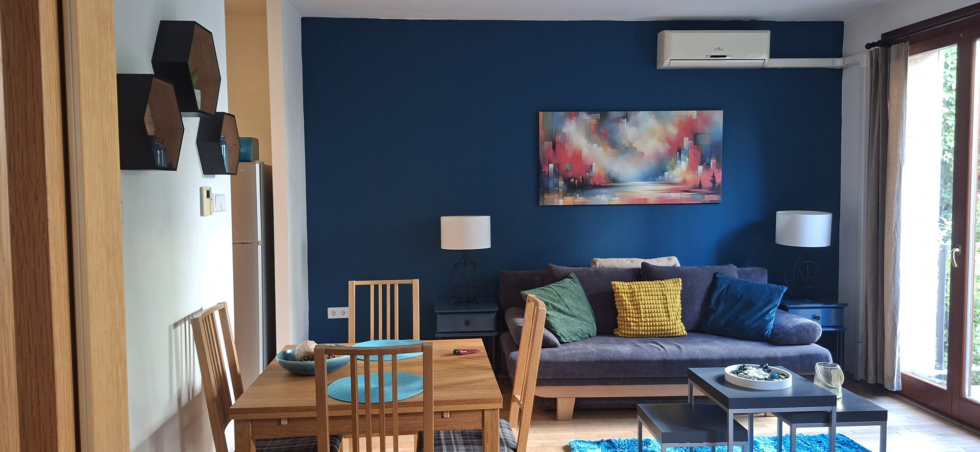 Living dining area blue accent wall