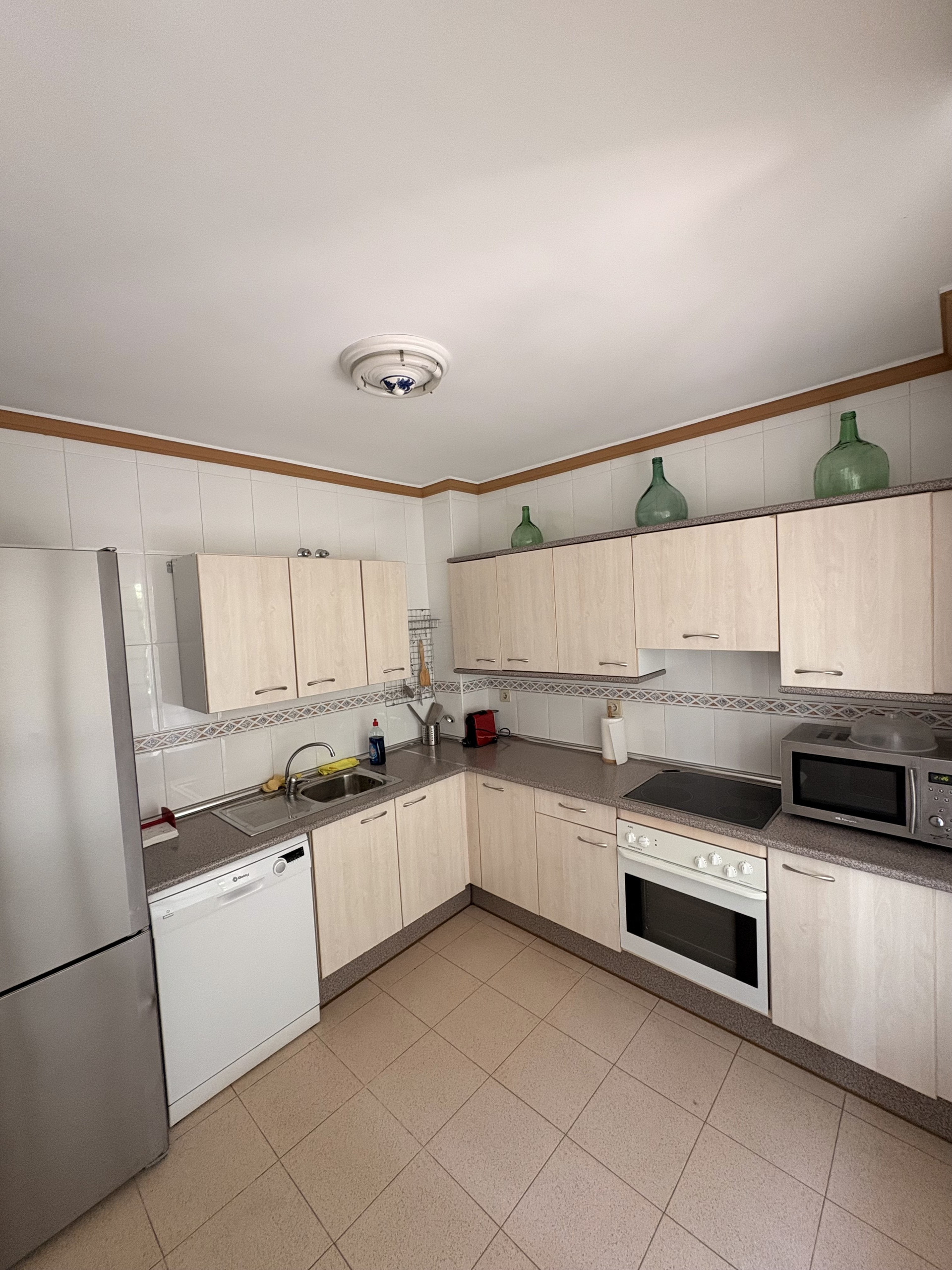 Kitchen with appliances and cabinets