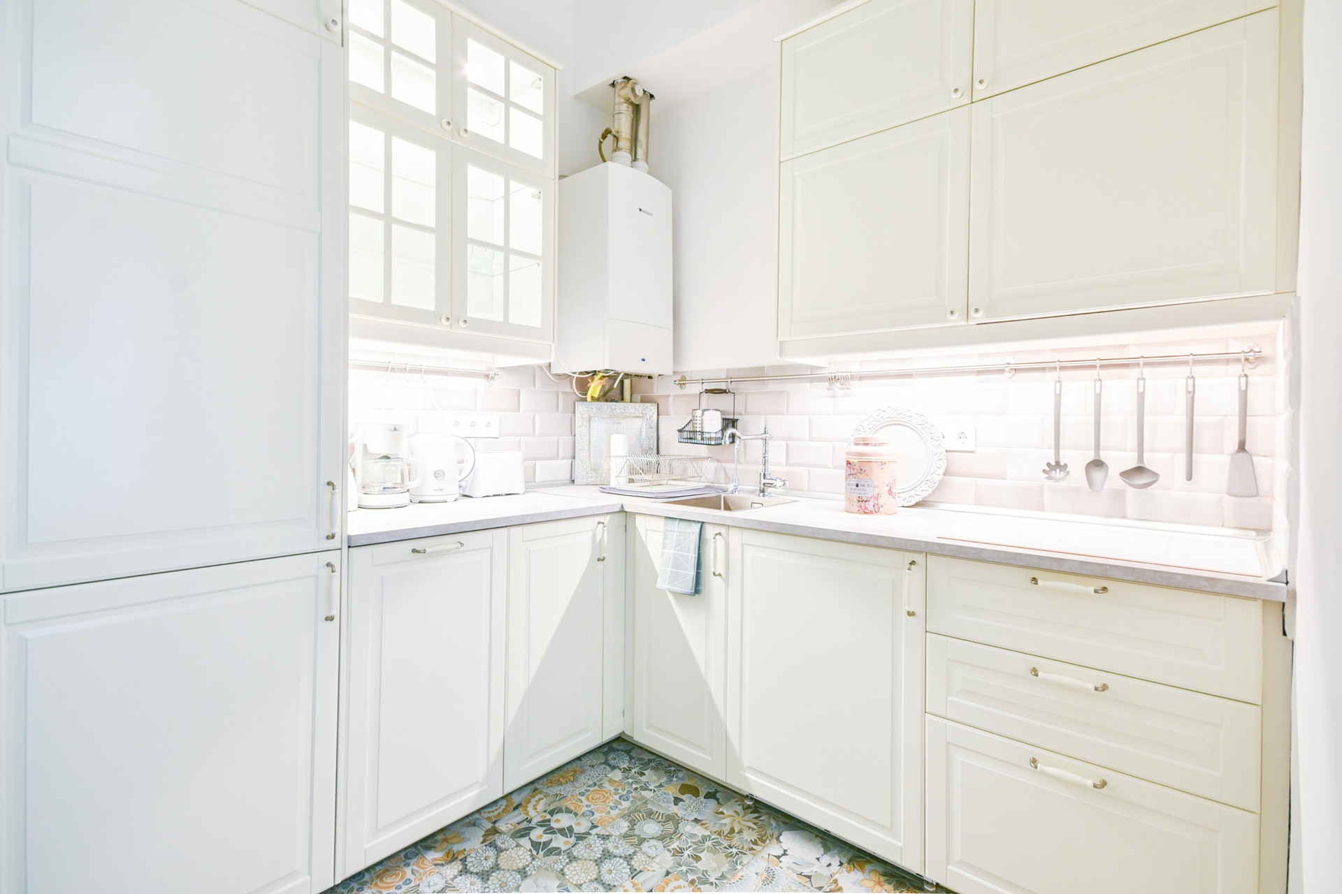 Bright white kitchen with tiles