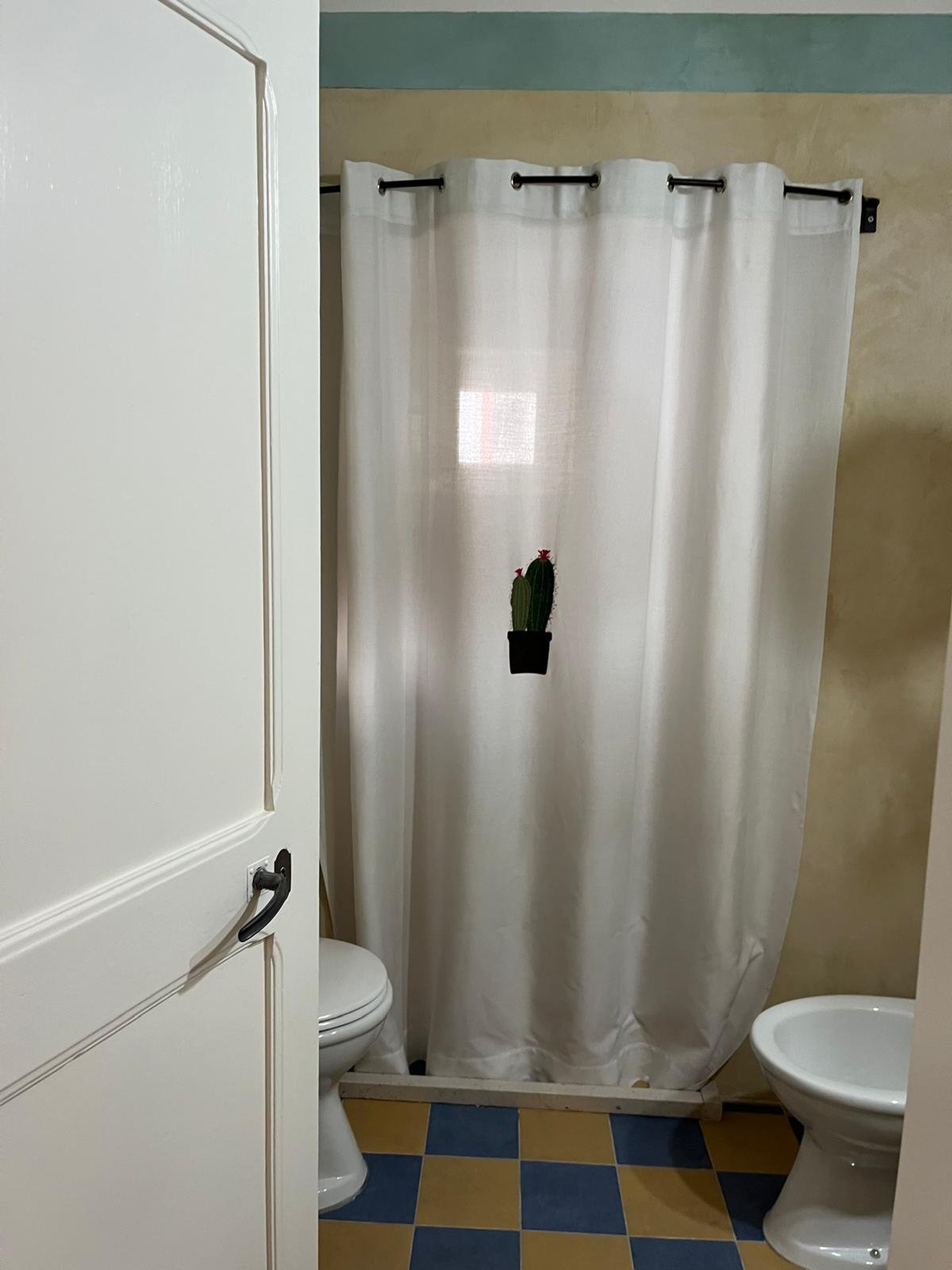 Bathroom with shower curtain