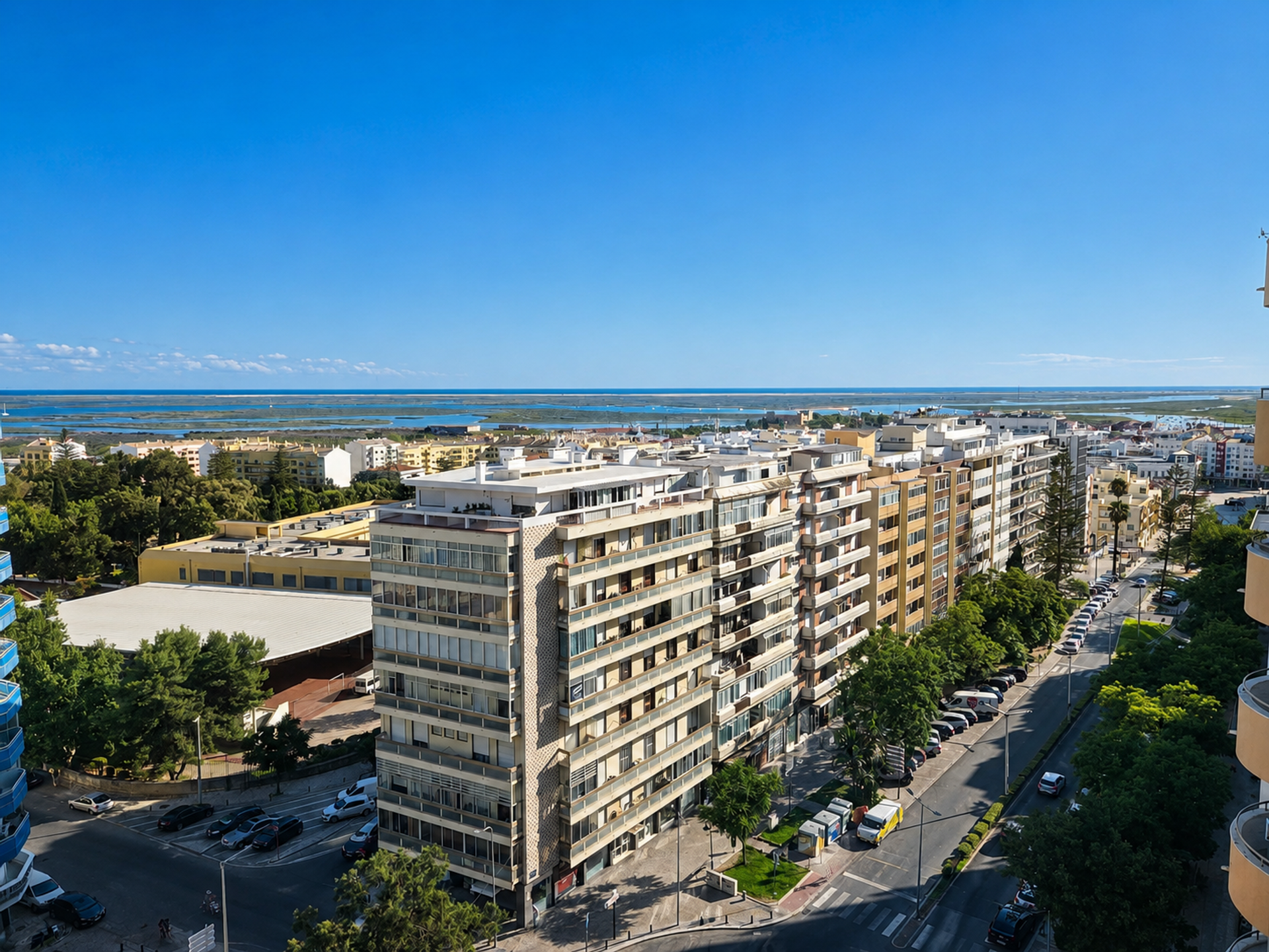 Aerial view of buildings and coast